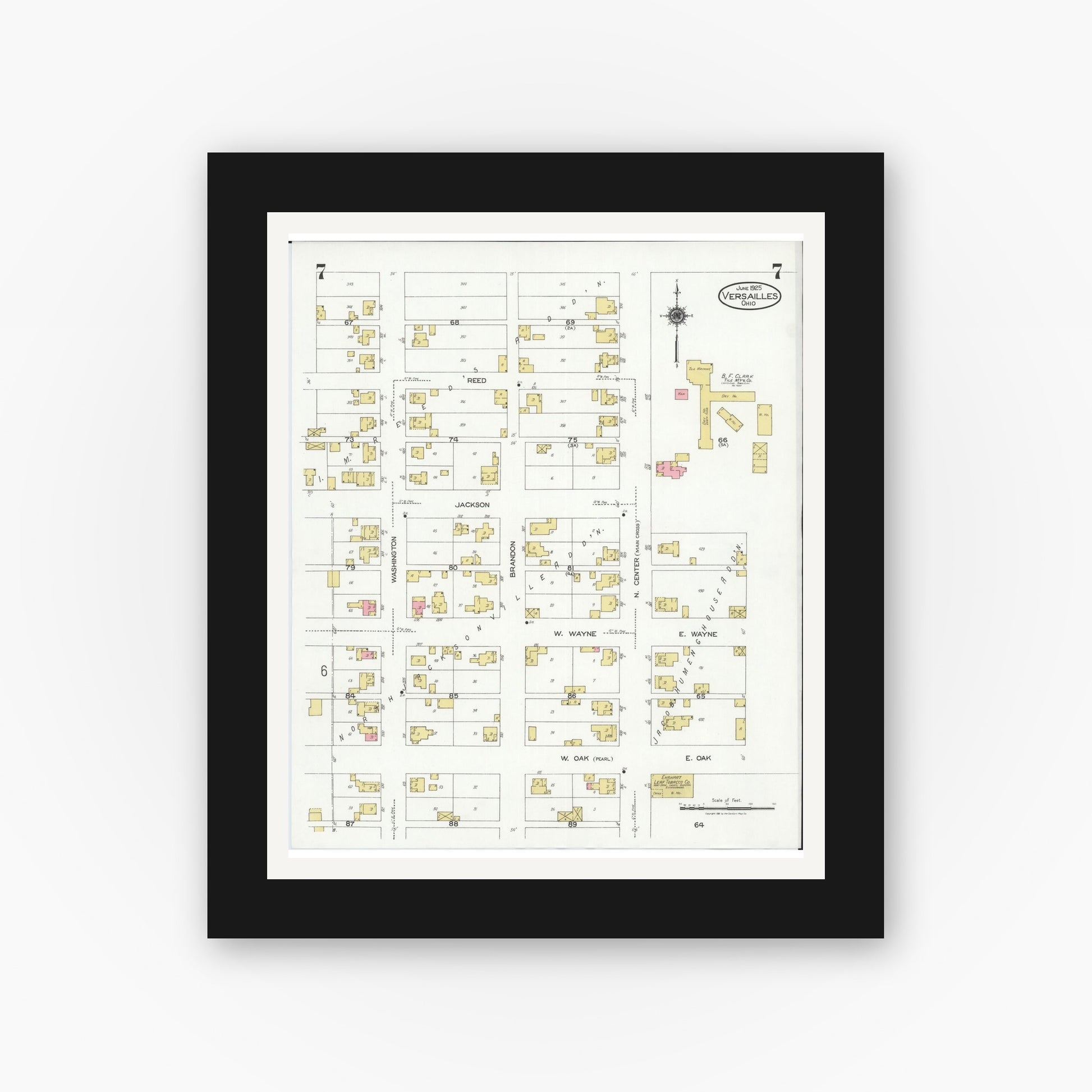 Old map wall art mockup — black gallery frame with white mat — Sanborn Fire Insurance Map from Versailles, Darke County, Ohio (1925), Sheet #0007