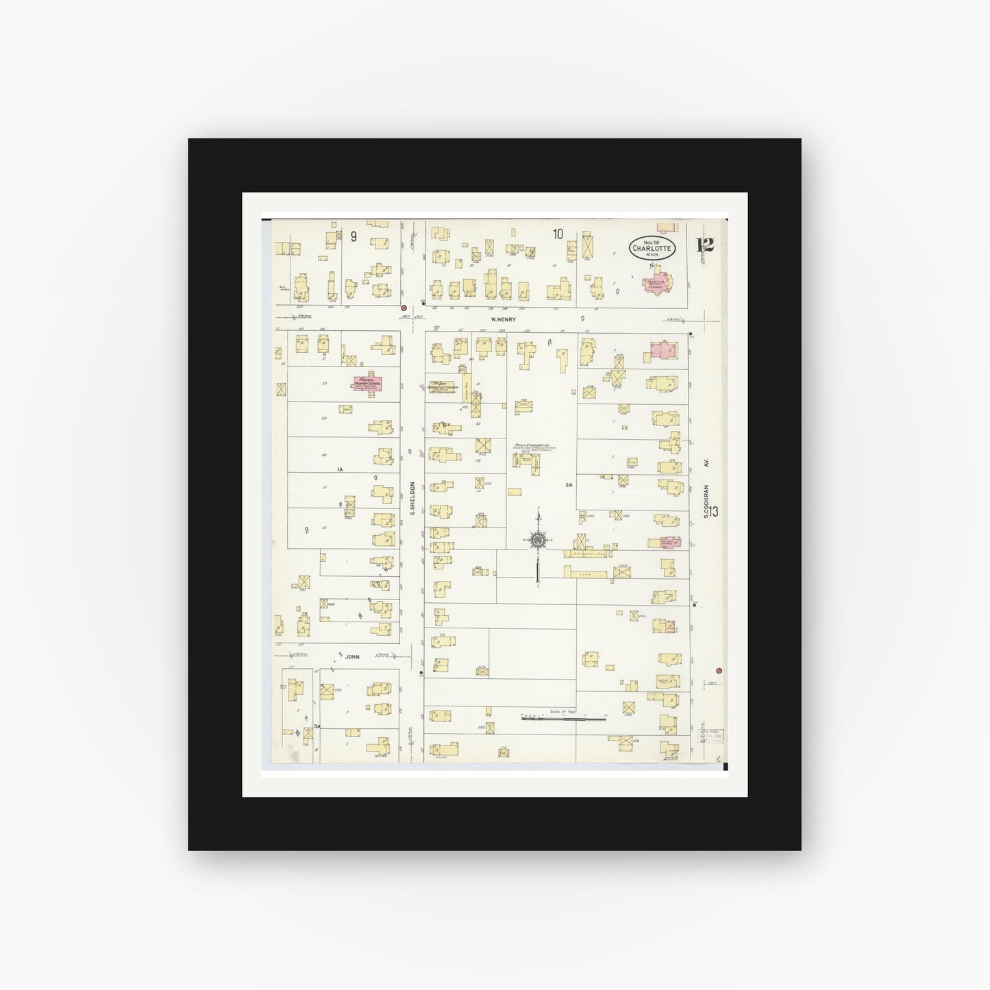Old map wall art mockup — black gallery frame with white mat — Sanborn Fire Insurance Map from Charlotte, Eaton County, Michigan (1911), Sheet #0012