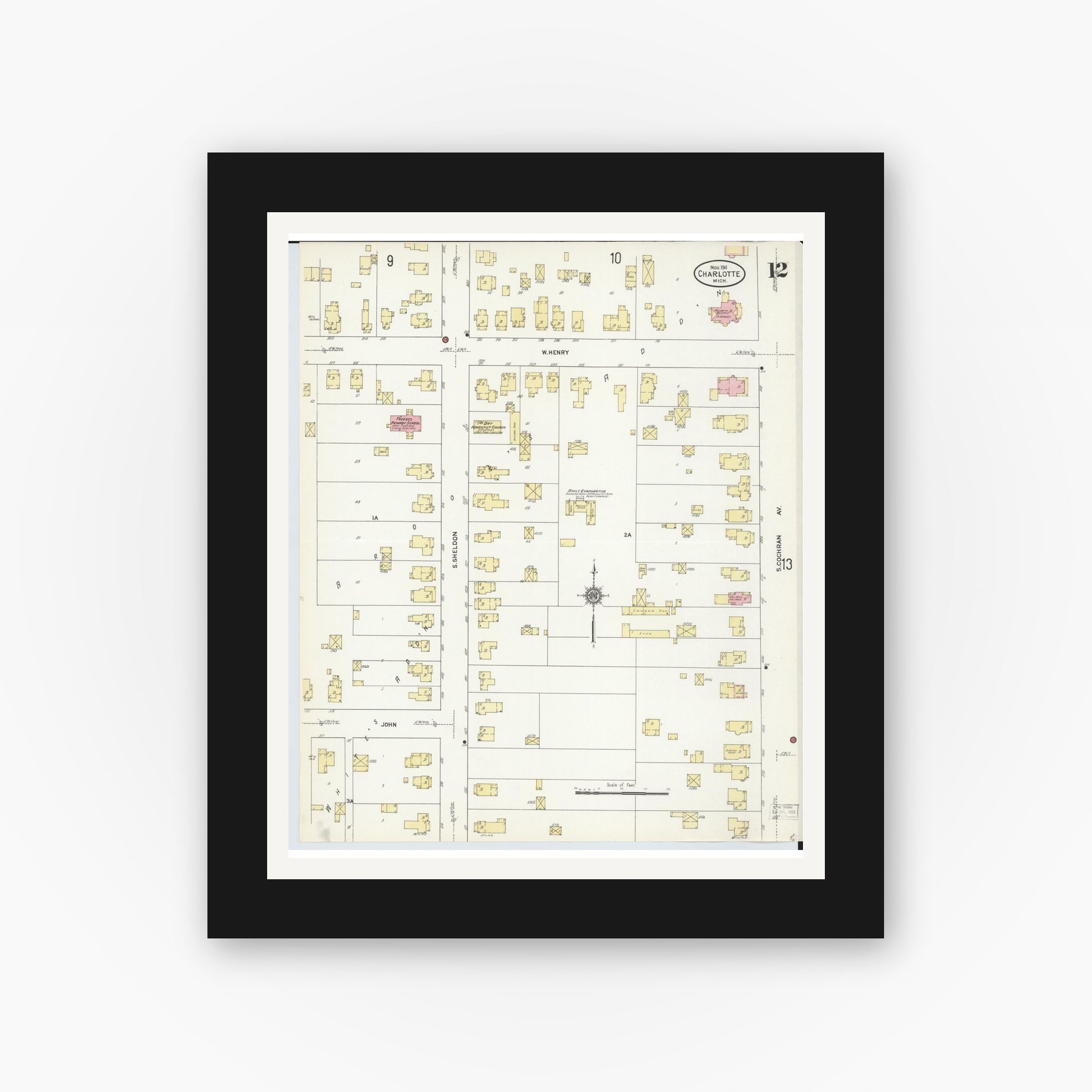 Old map wall art mockup — black gallery frame with white mat — Sanborn Fire Insurance Map from Charlotte, Eaton County, Michigan (1911), Sheet #0012