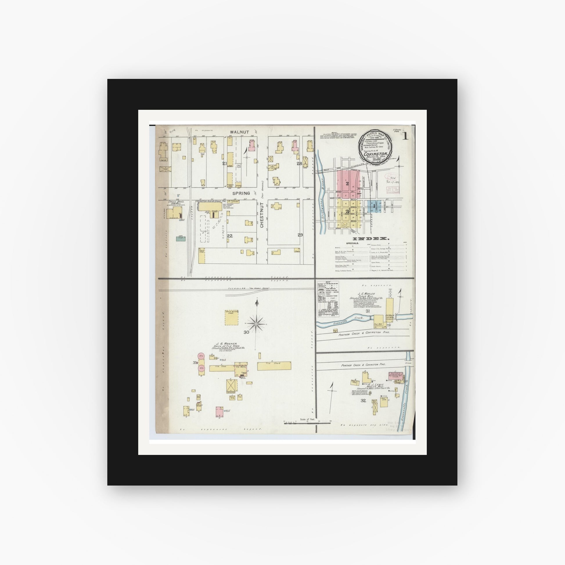 Old map wall art mockup — black gallery frame with white mat — Sanborn Fire Insurance Map from Covington, Miami County, Ohio (1892), Sheet #0001