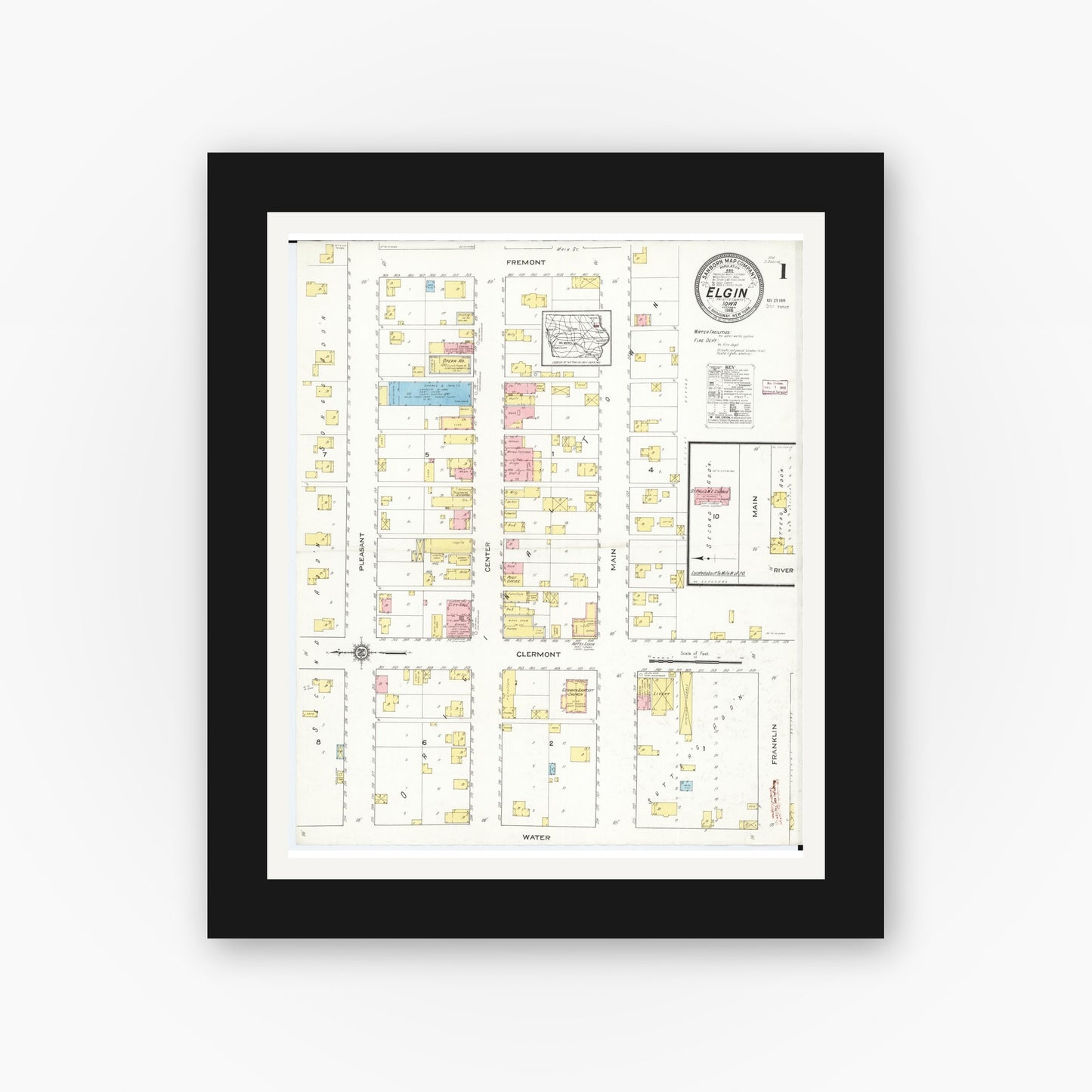 Old map wall art mockup — black gallery frame with white mat — Sanborn Fire Insurance Map from Elgin, Fayette County, Iowa (1915) â€” Complete Set