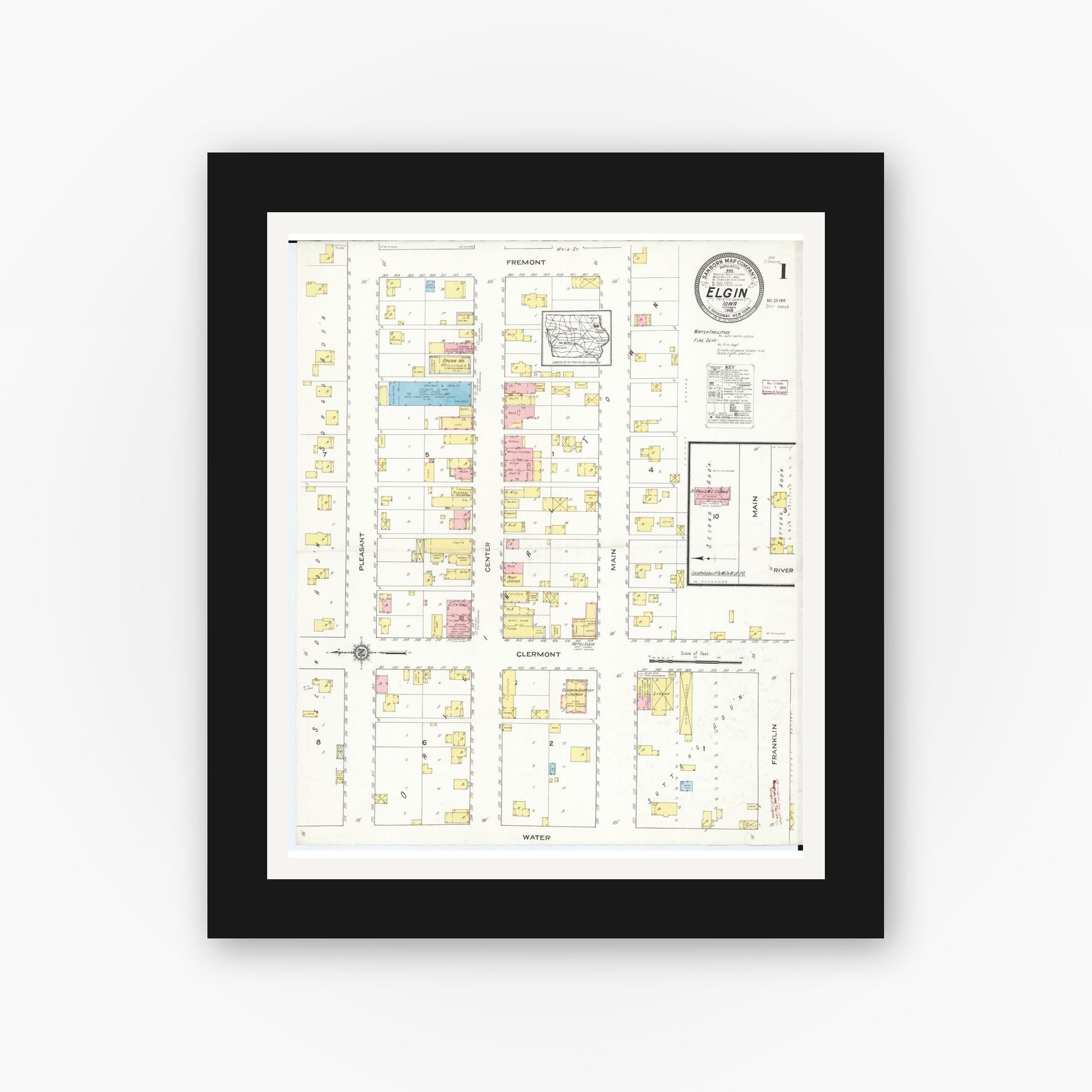 Old map wall art mockup — black gallery frame with white mat — Sanborn Fire Insurance Map from Elgin, Fayette County, Iowa (1915) â€” Complete Set