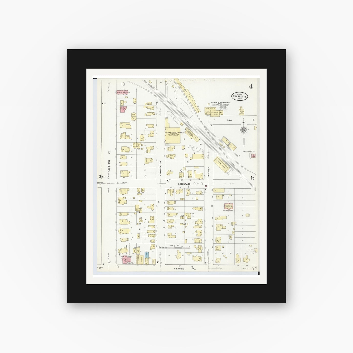 Old map wall art mockup — black gallery frame with white mat — Sanborn Fire Insurance Map from Charlotte, Eaton County, Michigan (1911), Sheet #0004