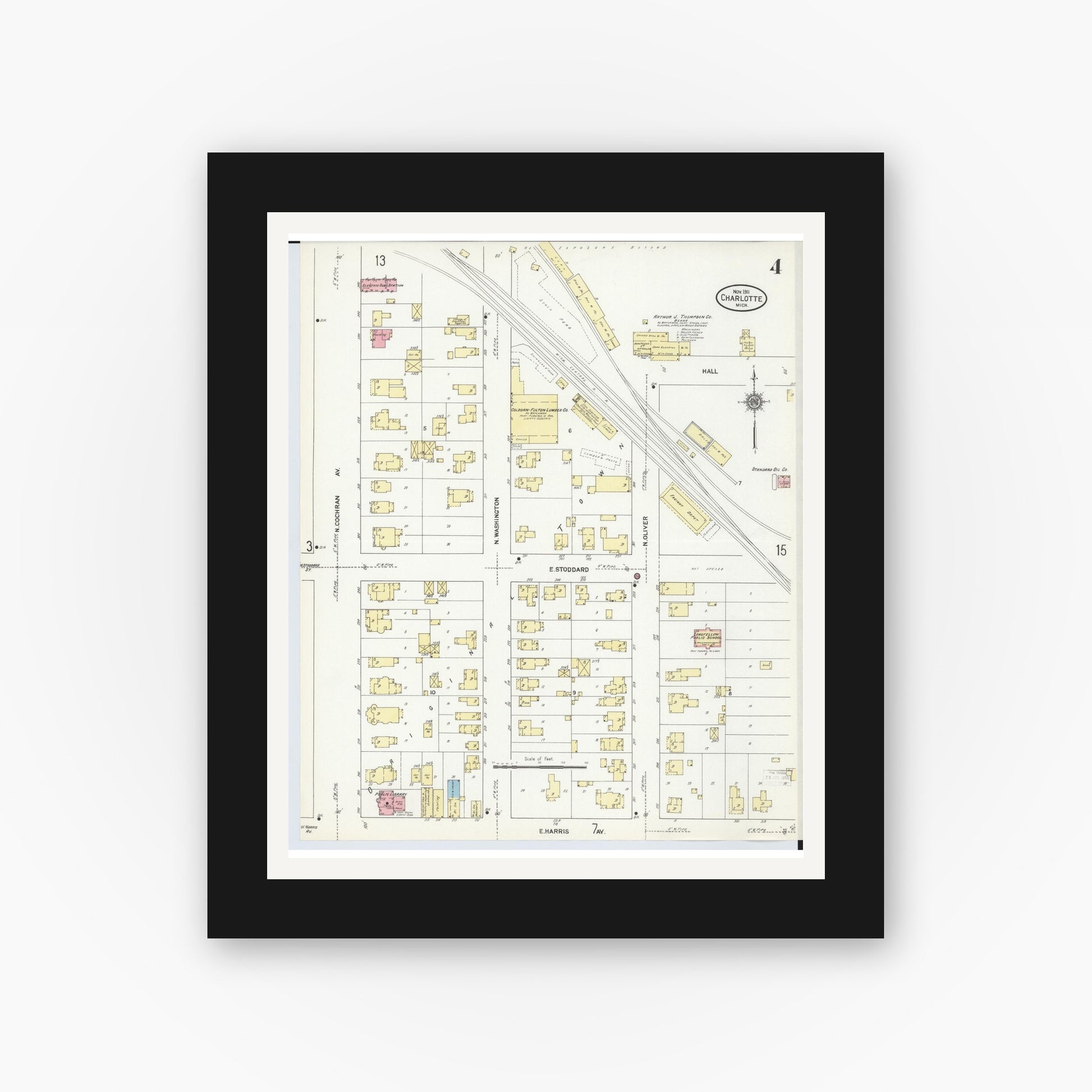 Old map wall art mockup — black gallery frame with white mat — Sanborn Fire Insurance Map from Charlotte, Eaton County, Michigan (1911), Sheet #0004