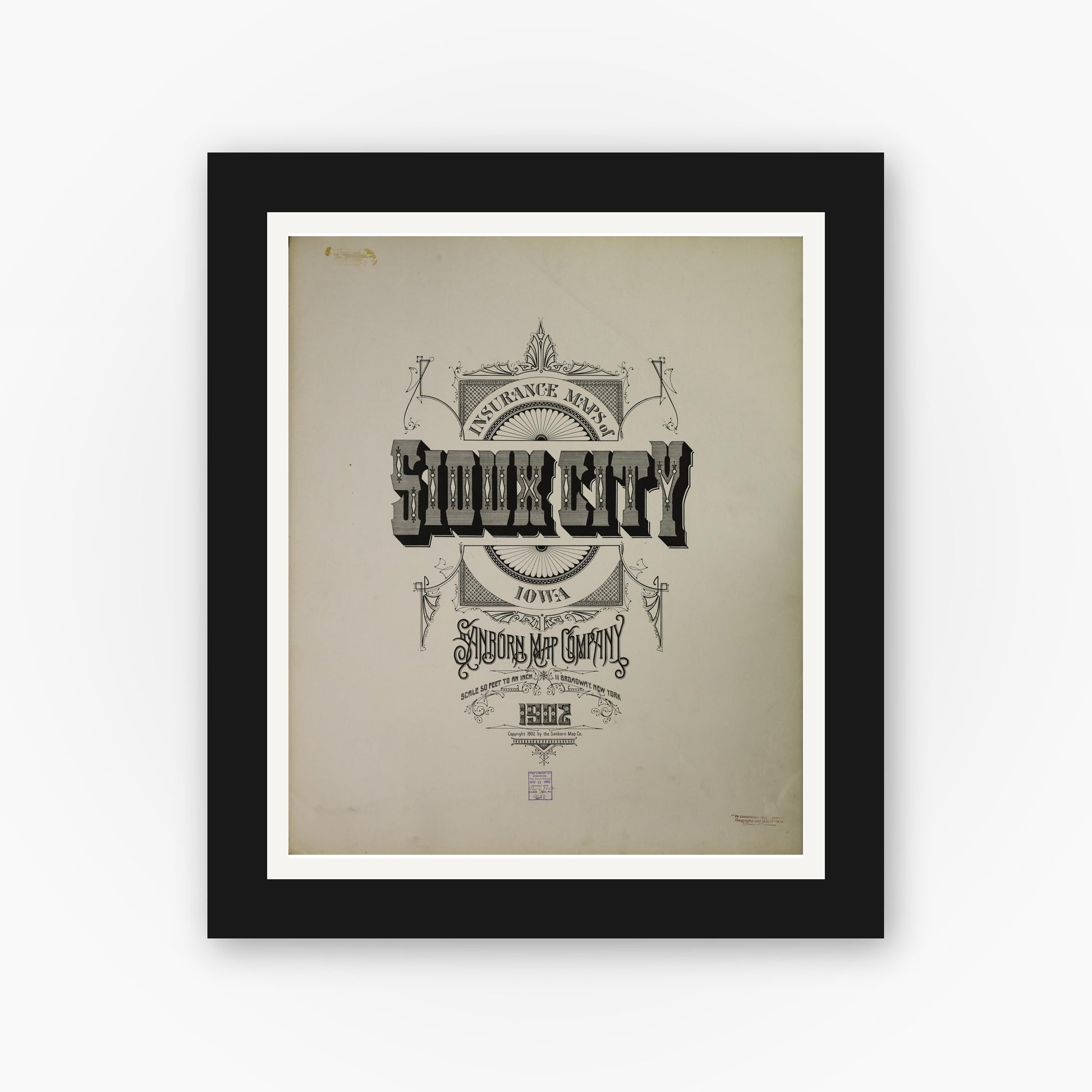 Old map wall art mockup — black gallery frame with white mat — Sanborn Fire Insurance Map from Sioux City, Woodbury County, Iowa (1902), Sheet #0001