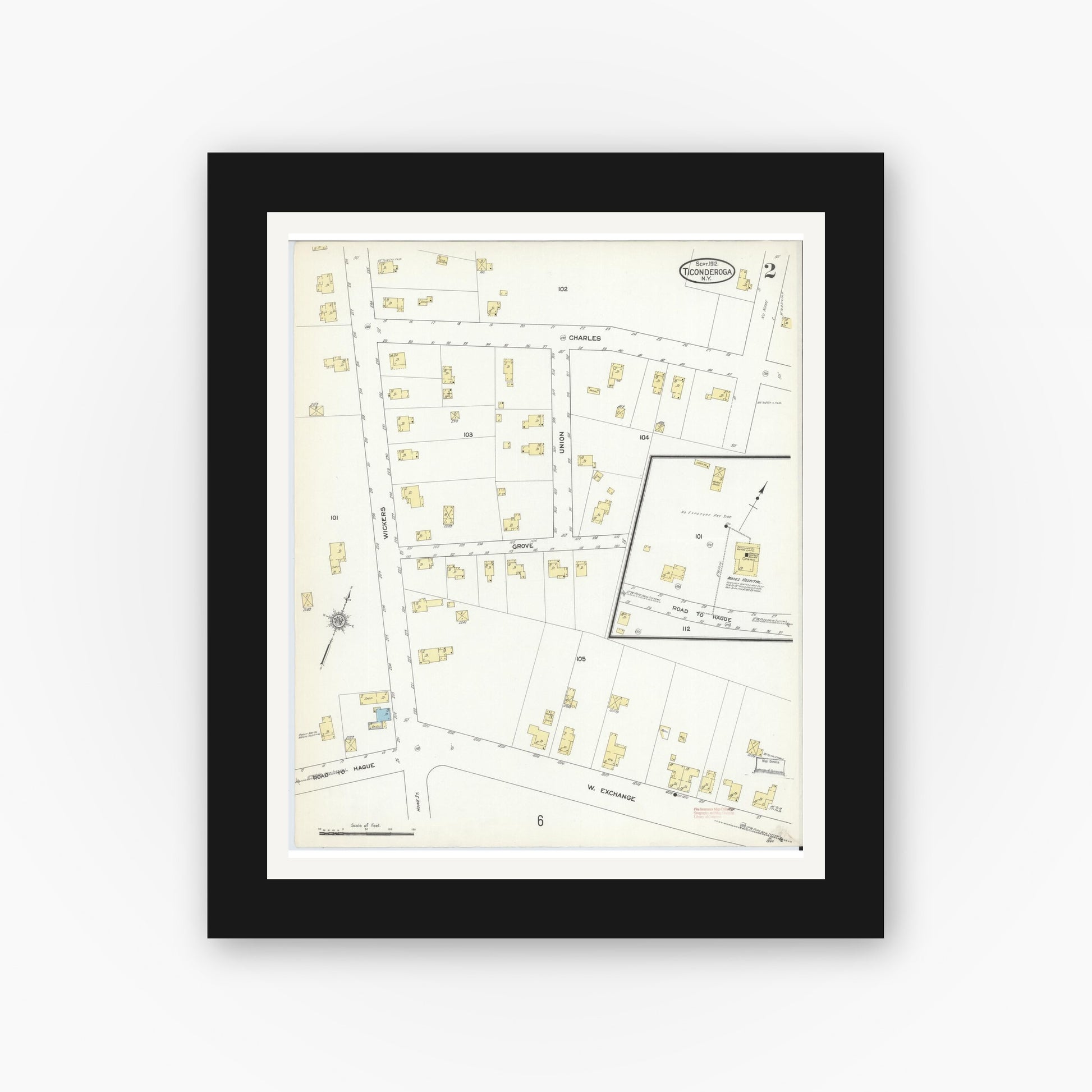 Old map wall art mockup — black gallery frame with white mat — Sanborn Fire Insurance Map from Ticonderoga, Essex County, New York (1912), Sheet #0002