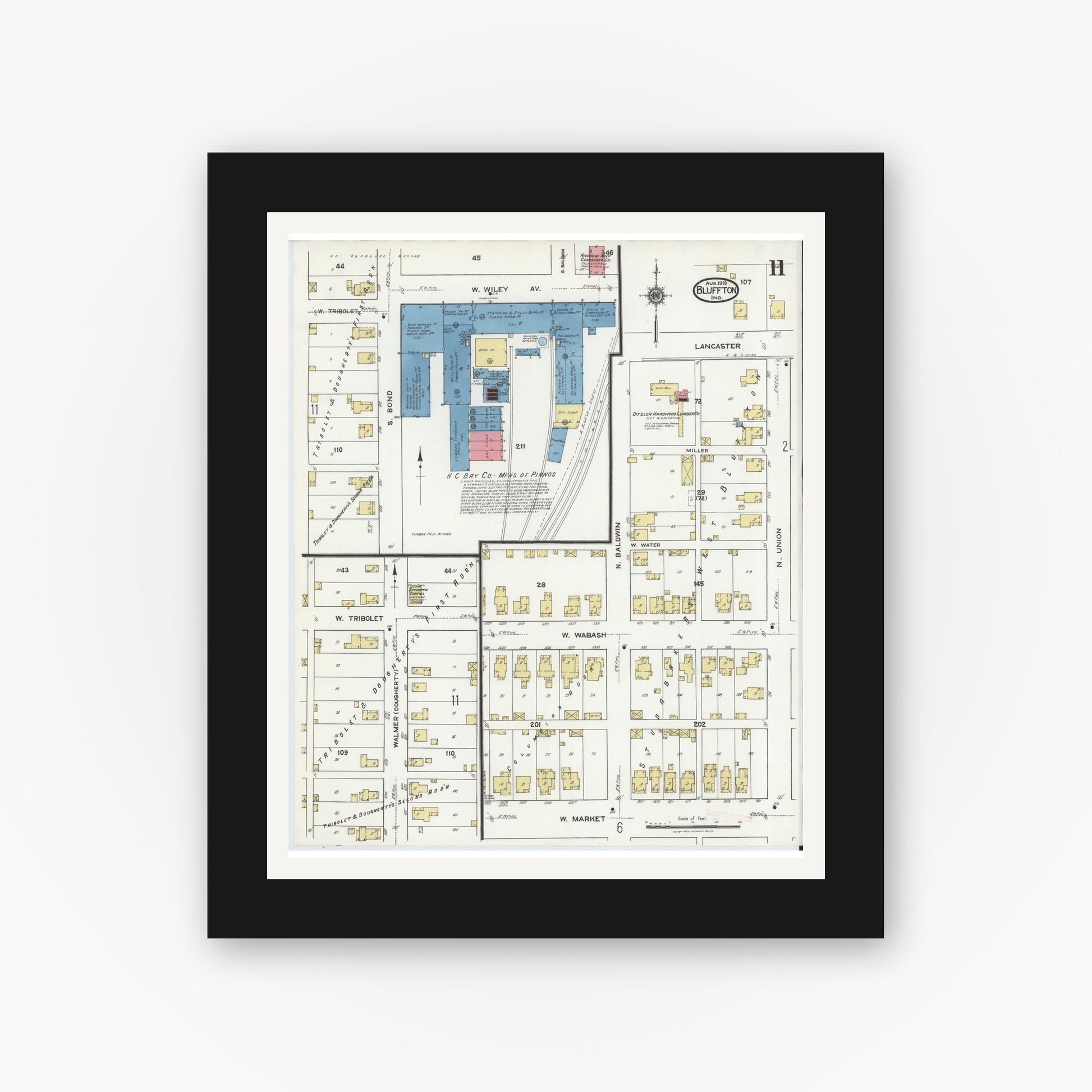 Old map wall art mockup — black gallery frame with white mat — Sanborn Fire Insurance Map from Bluffton, Wells County, Indiana (1919), Sheet #0011