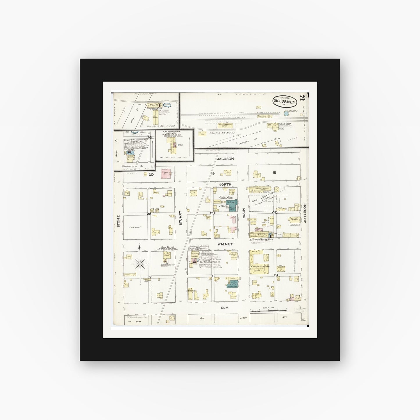 Old map wall art mockup — black gallery frame with white mat — Sanborn Fire Insurance Map from Sigourney, Kiokuk County, Iowa (1888), Sheet #0002