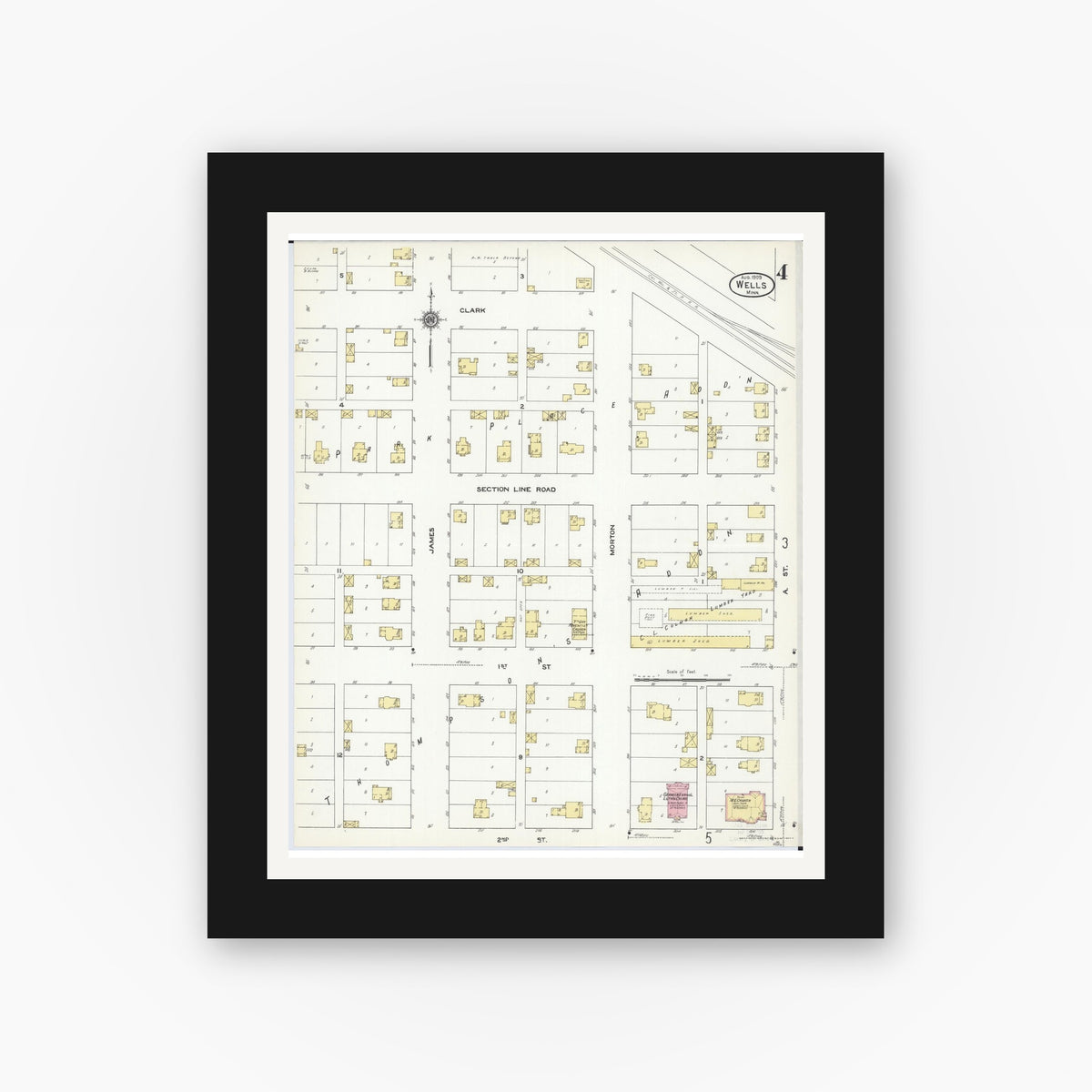 Old map wall art mockup — black gallery frame with white mat — Sanborn Fire Insurance Map from Wells, Faribault County, Minnesota (1909), Sheet #0004