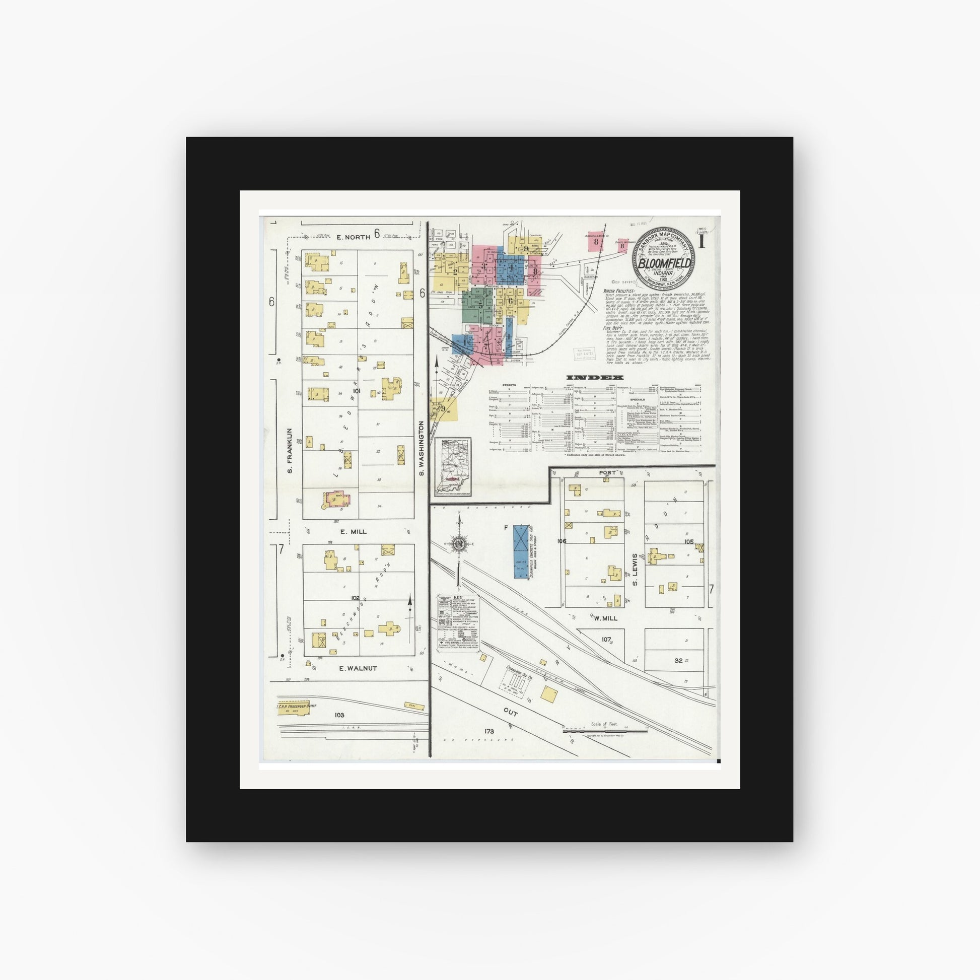Old map wall art mockup — black gallery frame with white mat — Sanborn Fire Insurance Map from Bloomfield, Greene County, Indiana (1921), Sheet #0001