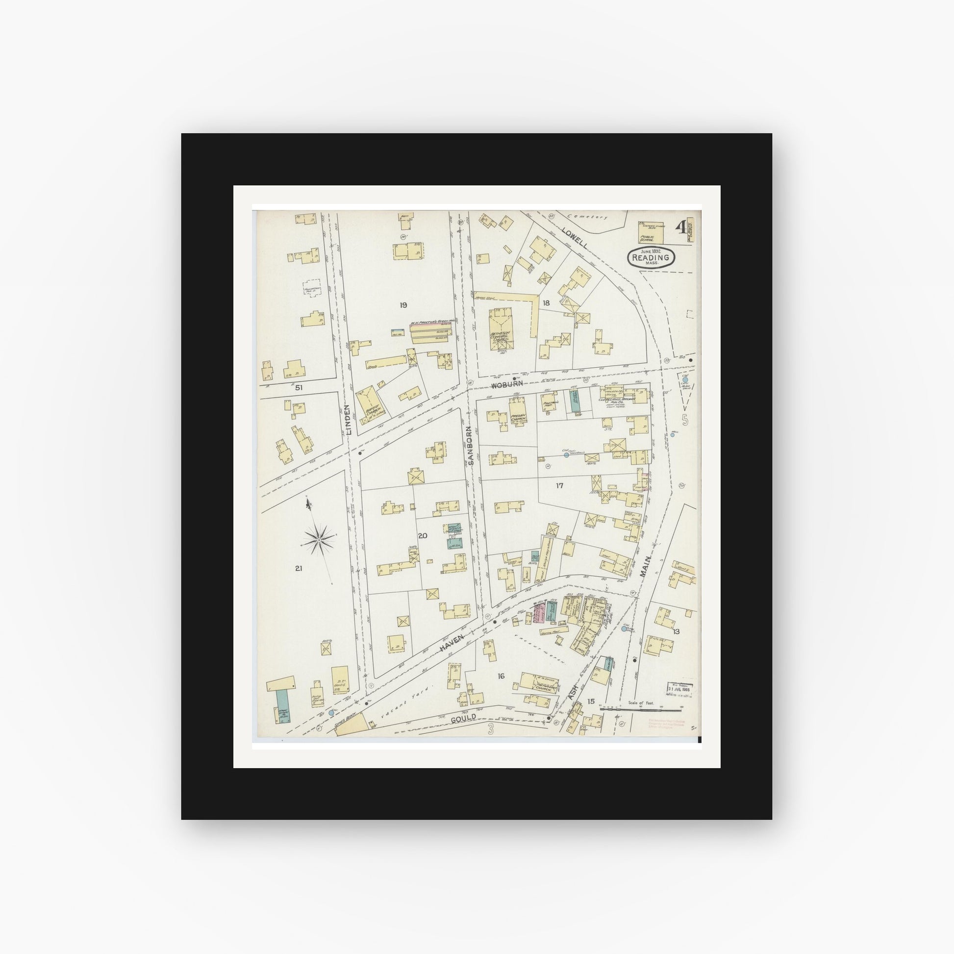 Old map wall art mockup — black gallery frame with white mat — Sanborn Fire Insurance Map from Reading, Middlesex County, Massachusetts (1892), Sheet #0004