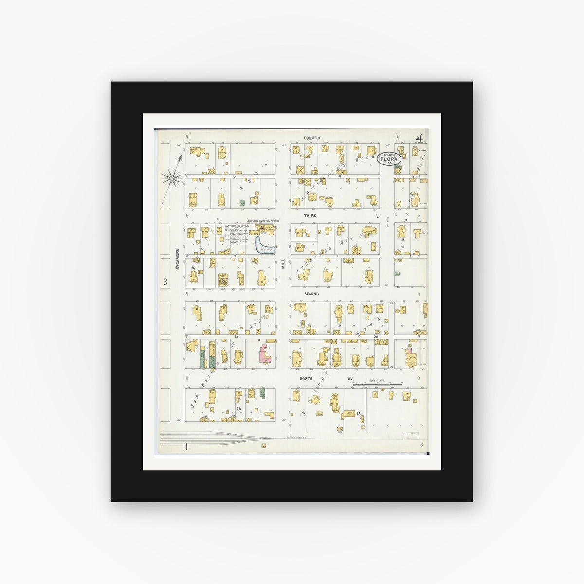 Old map wall art mockup — black gallery frame with white mat — Sanborn Fire Insurance Map from Flora, Clay County, Illinois (1899), Sheet #0004