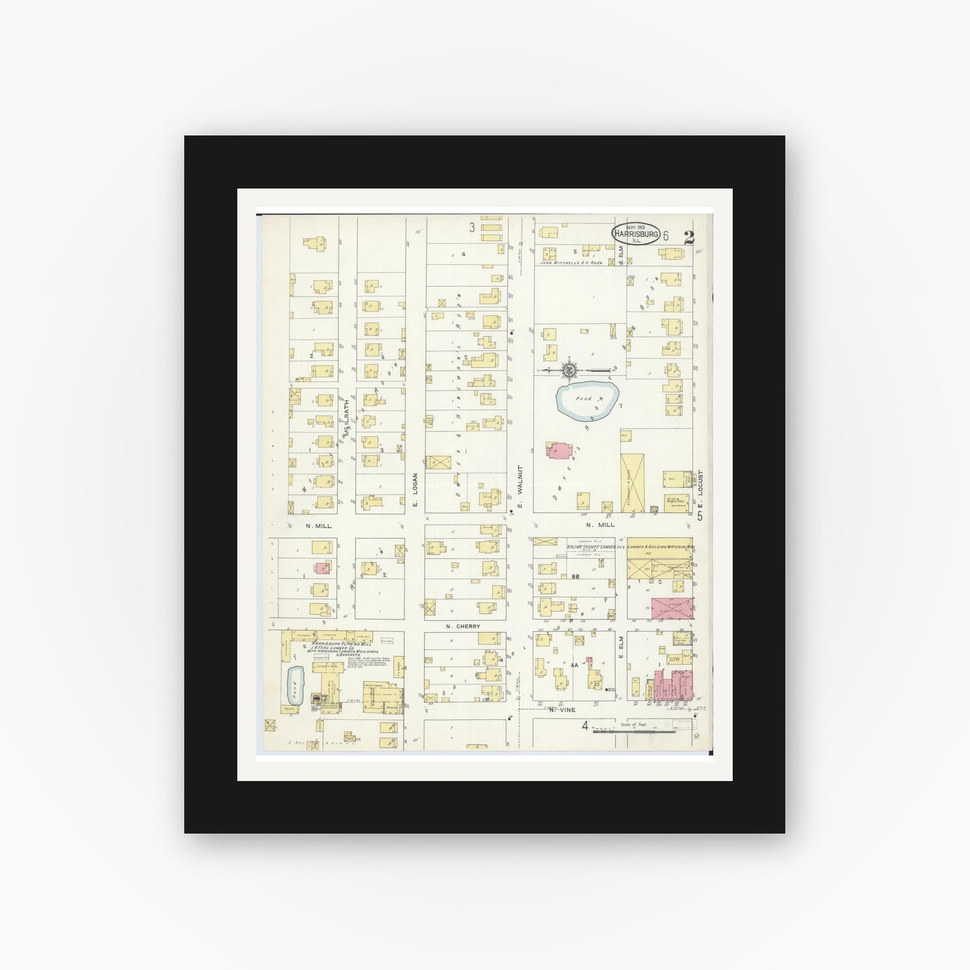 Old map wall art mockup — black gallery frame with white mat — Sanborn Fire Insurance Map from Harrisburg, Saline County, Illinois (1913), Sheet #0002