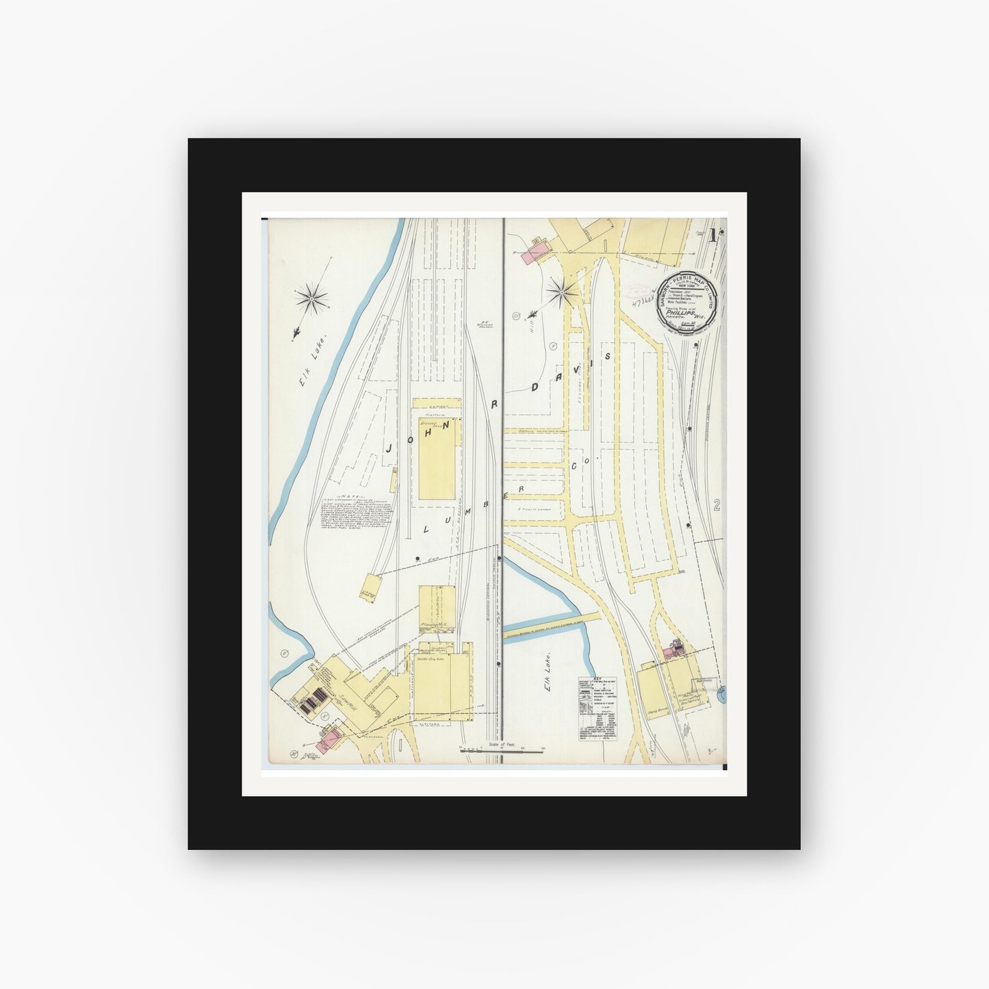 Old map wall art mockup — black gallery frame with white mat — Sanborn Fire Insurance Map from Phillips, Price County, Wisconsin (1892) - Complete Map Set
