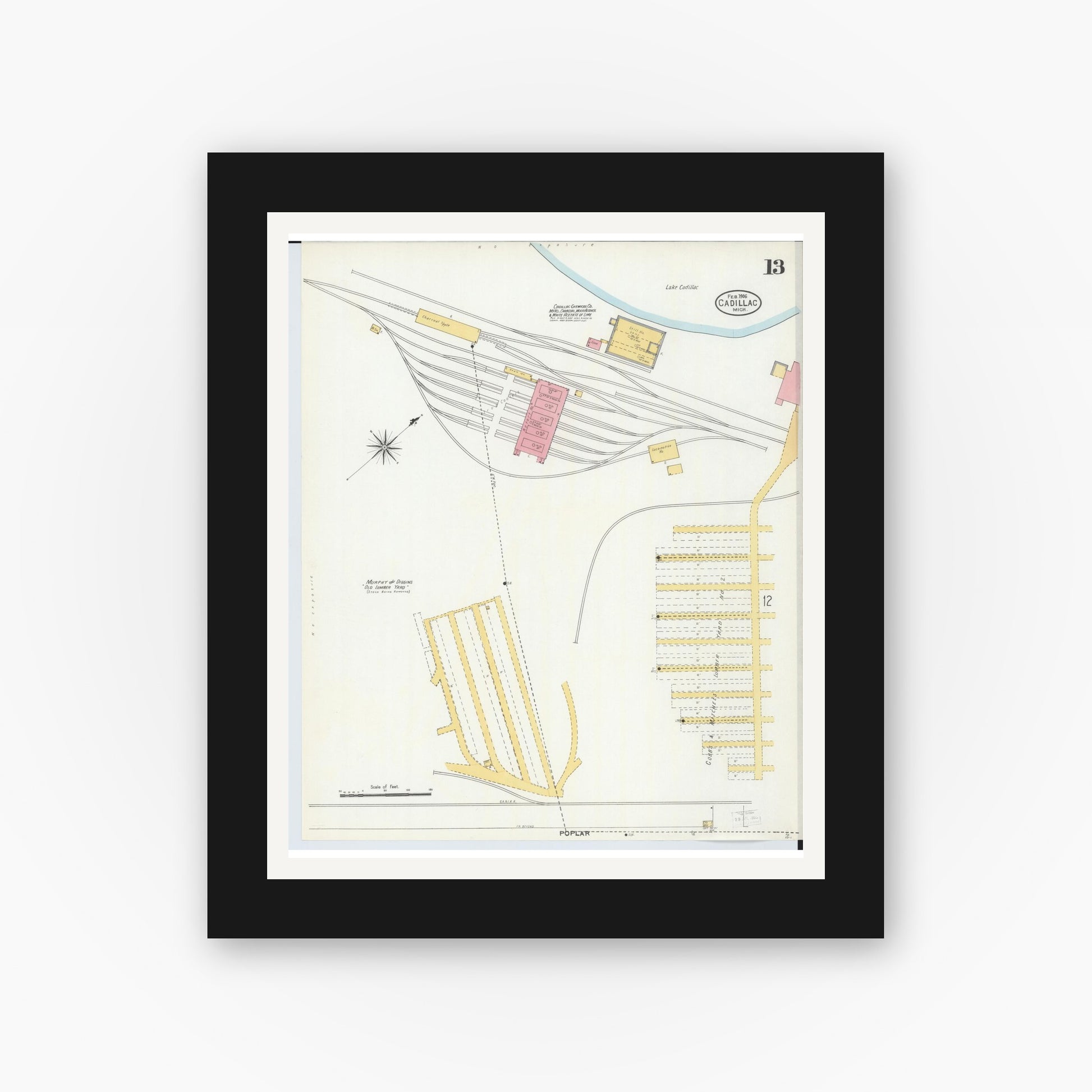 Old map wall art mockup — black gallery frame with white mat — Sanborn Fire Insurance Map from Cadillac, Wexford County, Michigan (1906), Sheet #0013