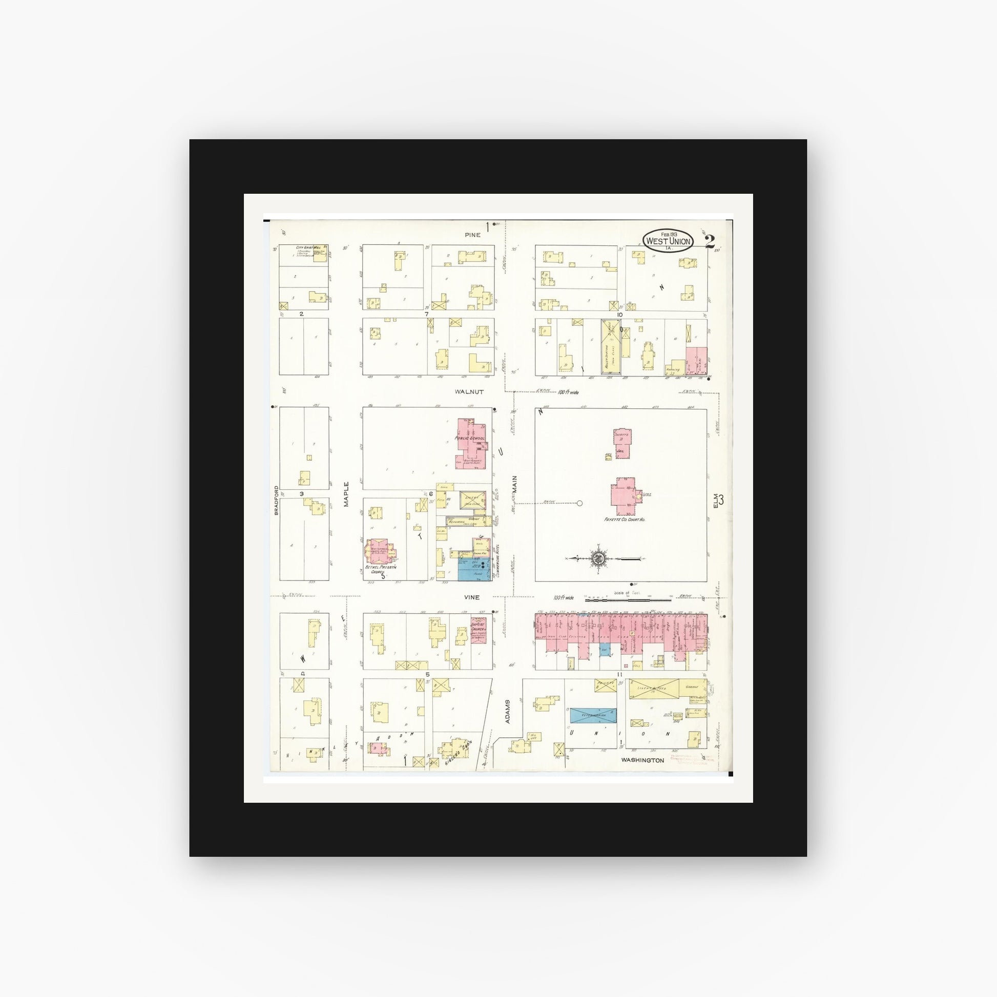 Old map wall art mockup — black gallery frame with white mat — Sanborn Fire Insurance Map from West Union, Fayette County, Iowa (1913), Sheet #0002