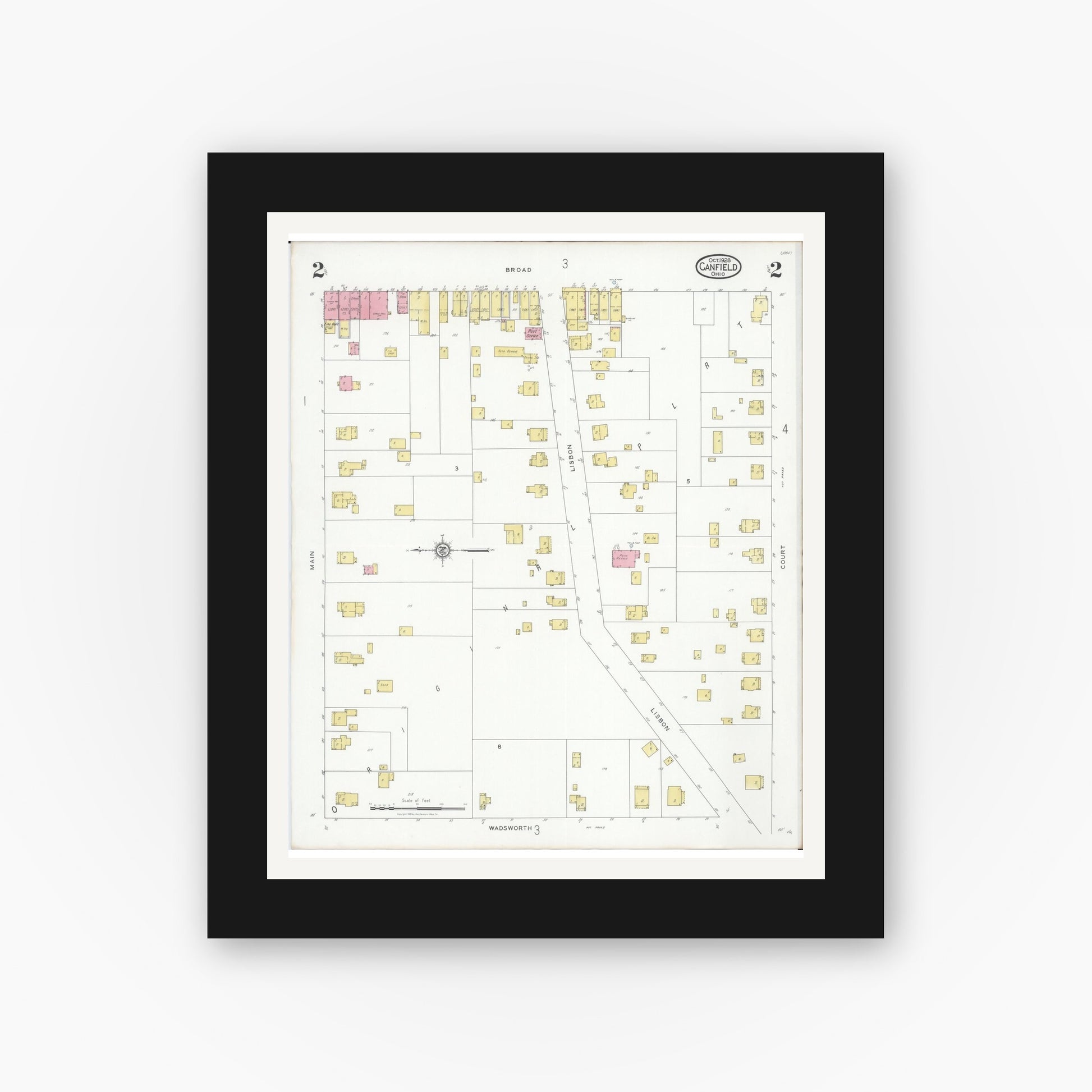 Old map wall art mockup — black gallery frame with white mat — Sanborn Fire Insurance Map from Canfield, Mahoning County, Ohio (1928), Sheet #0002