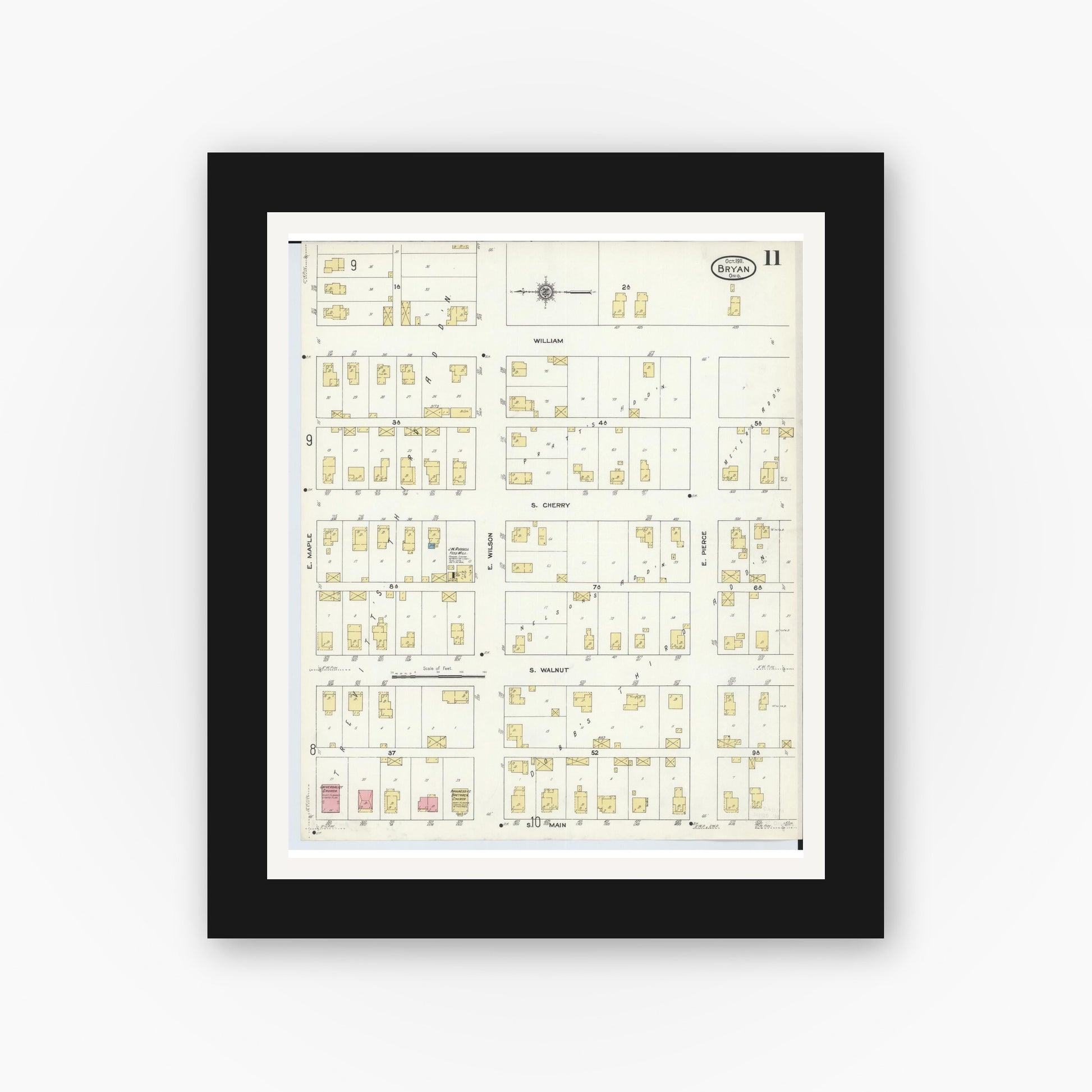 Old map wall art mockup — black gallery frame with white mat — Sanborn Fire Insurance Map from Bryan, Williams County, Ohio (1911), Sheet #0011