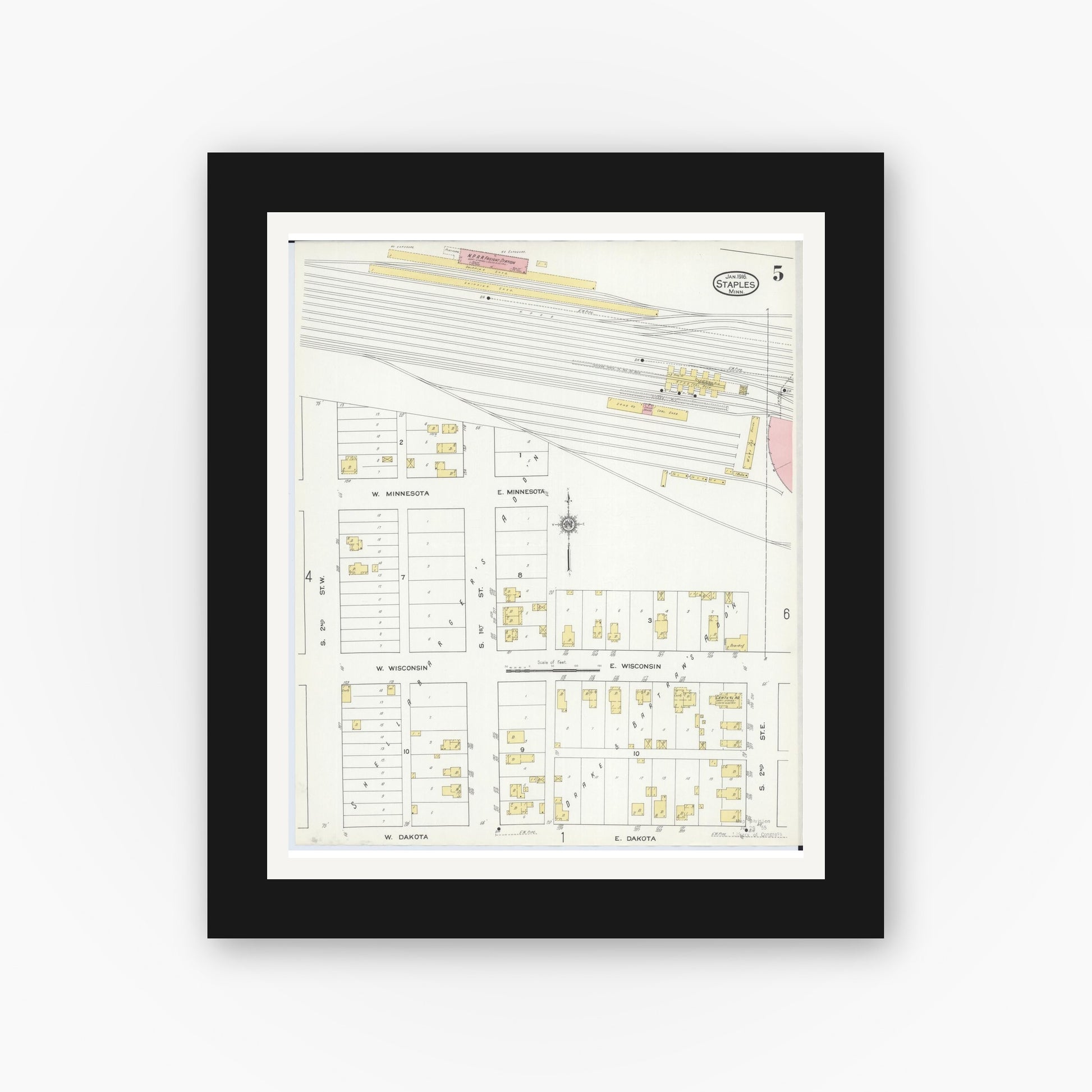 Old map wall art mockup — black gallery frame with white mat — Sanborn Fire Insurance Map from Staples, Todd County, Minnesota (1916), Sheet #0005
