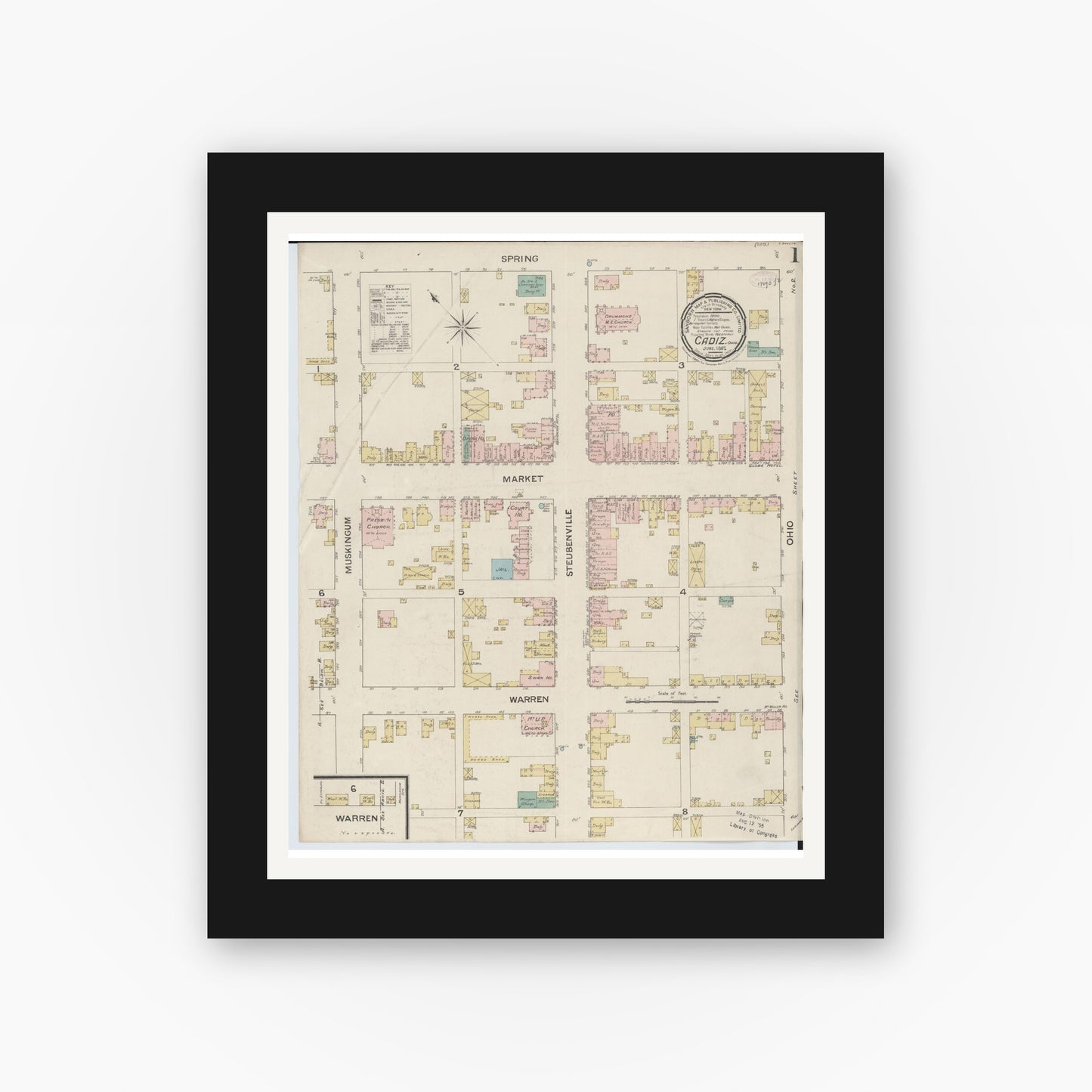 Old map wall art mockup — black gallery frame with white mat — Sanborn Fire Insurance Map from Cadiz, Harrison County, Ohio (1887), Sheet #0001