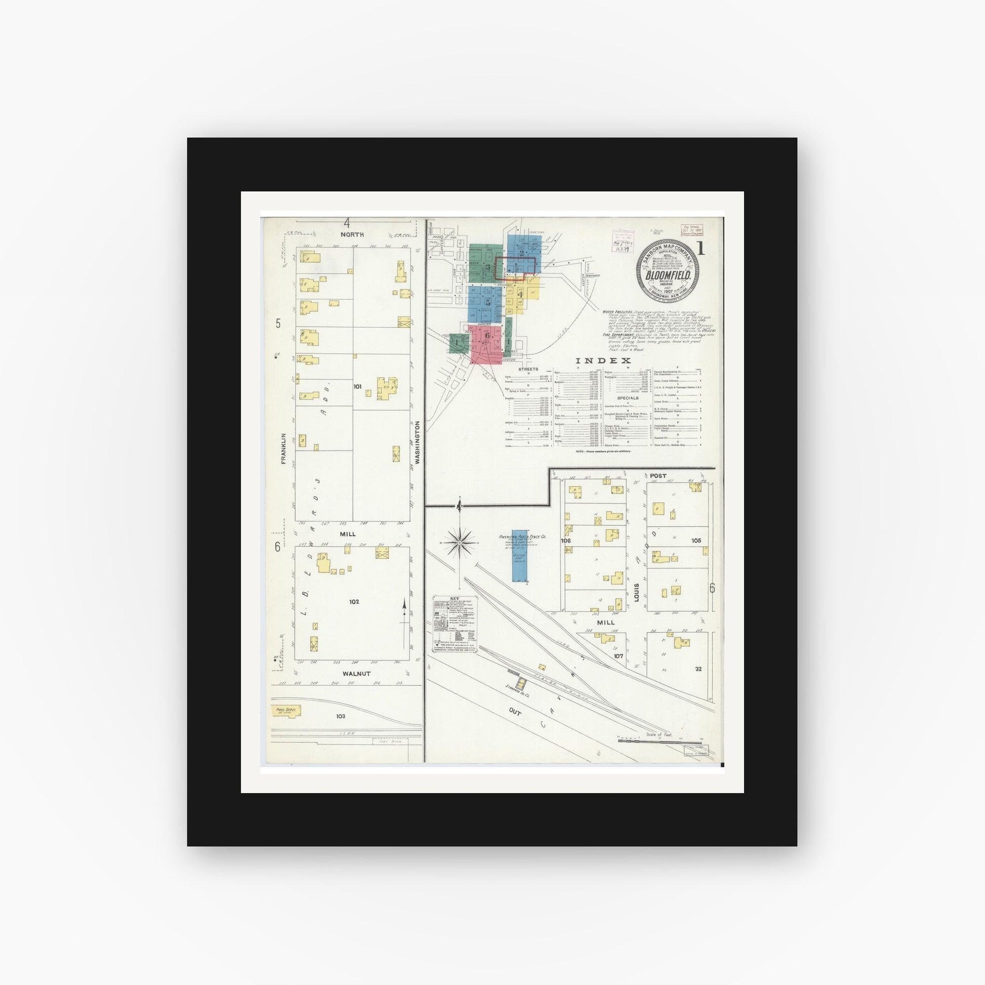 Old map wall art mockup — black gallery frame with white mat — Sanborn Fire Insurance Map from Bloomfield, Greene County, Indiana (1907), Sheet #0001