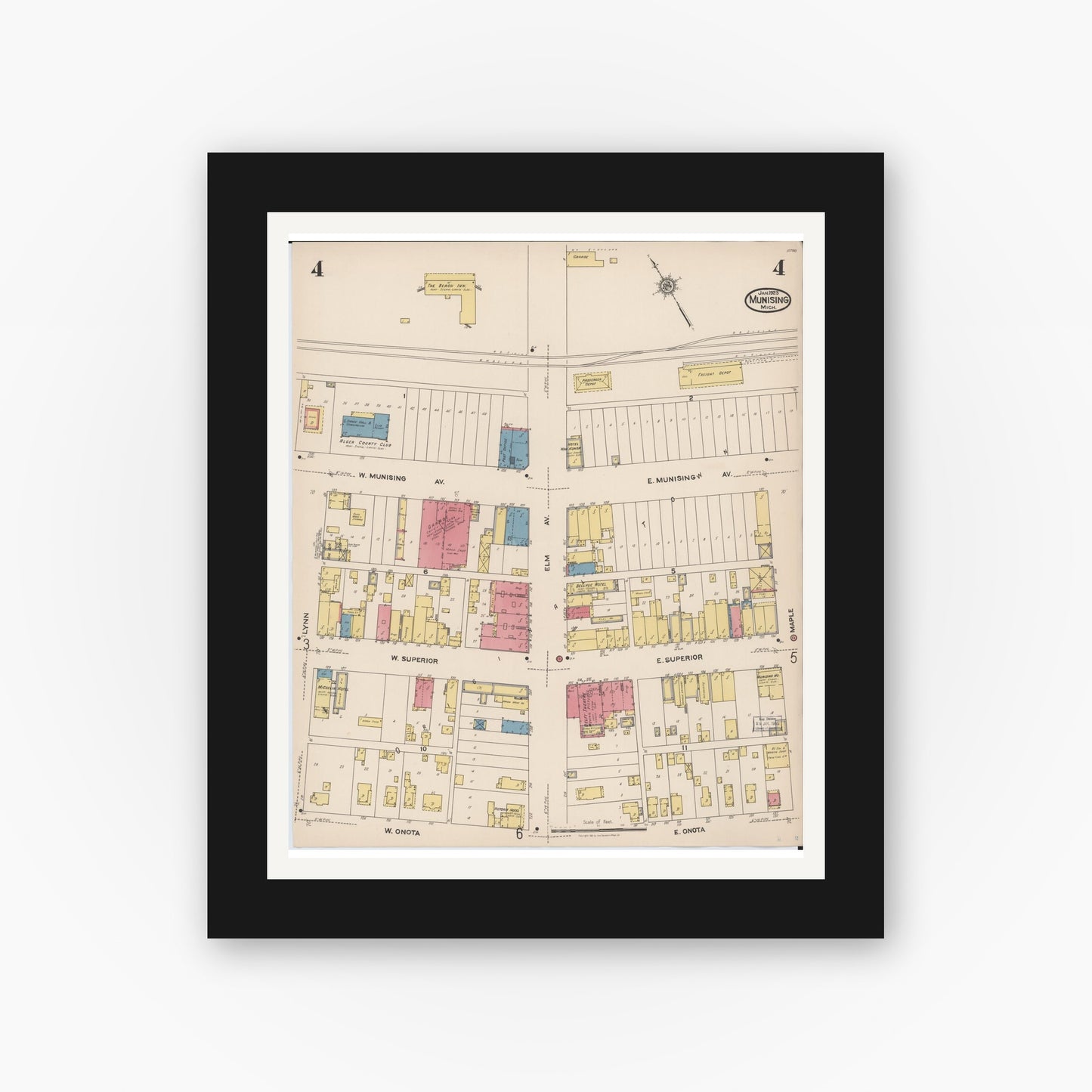Old map wall art mockup — black gallery frame with white mat — Sanborn Fire Insurance Map from Munising, Alger County, Michigan (1923), Sheet #0004