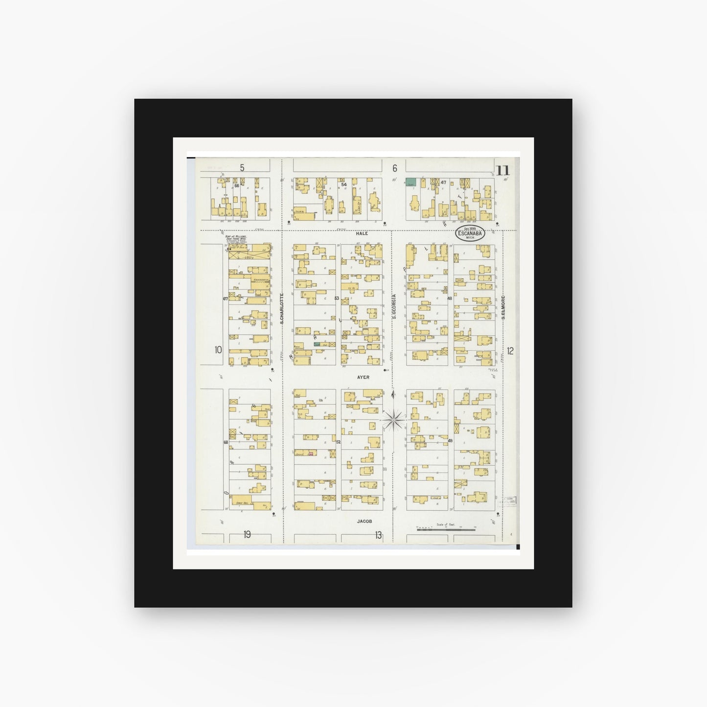 Old map wall art mockup — black gallery frame with white mat — Sanborn Fire Insurance Map from Escanaba, Delta County, Michigan (1899), Sheet #0011