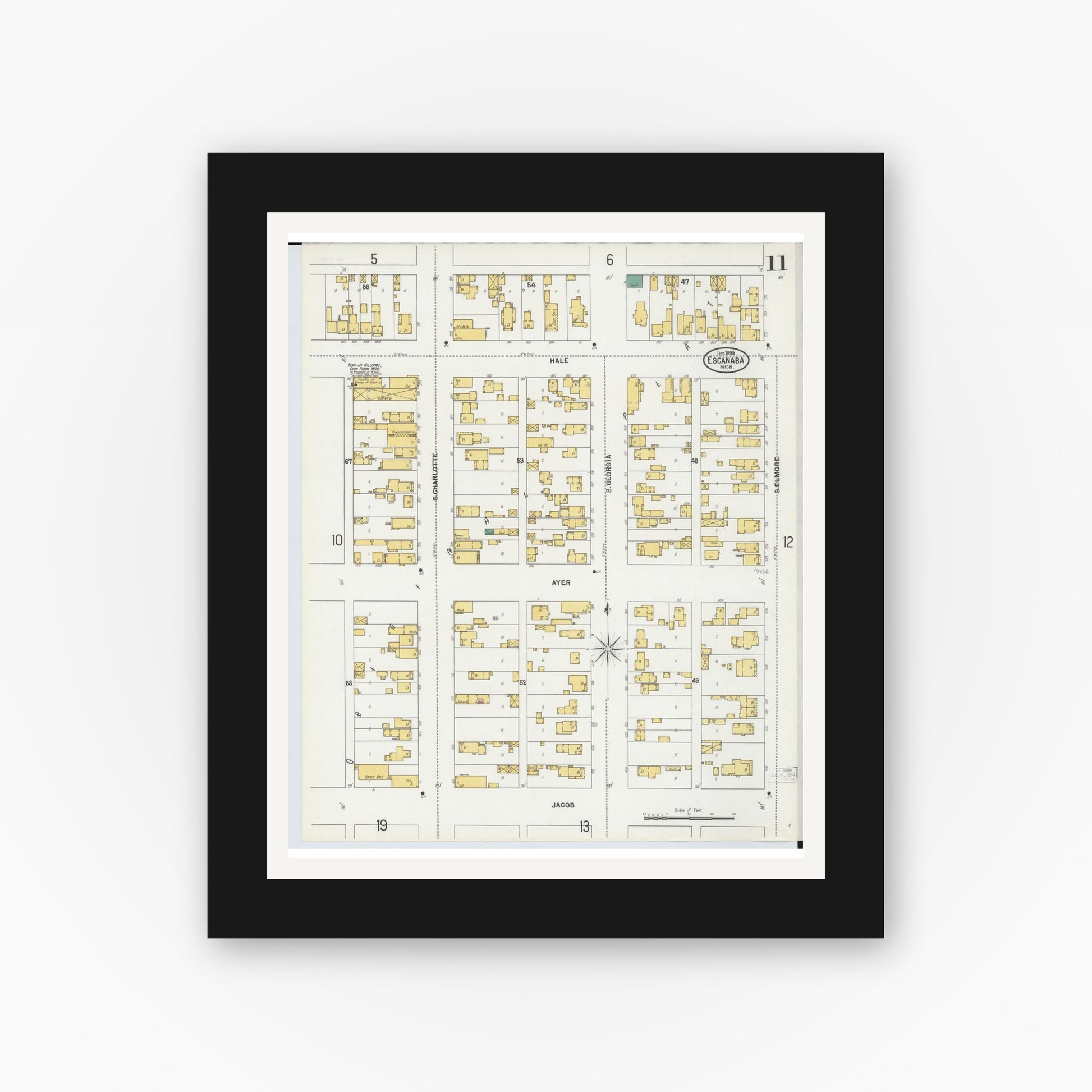 Old map wall art mockup — black gallery frame with white mat — Sanborn Fire Insurance Map from Escanaba, Delta County, Michigan (1899), Sheet #0011