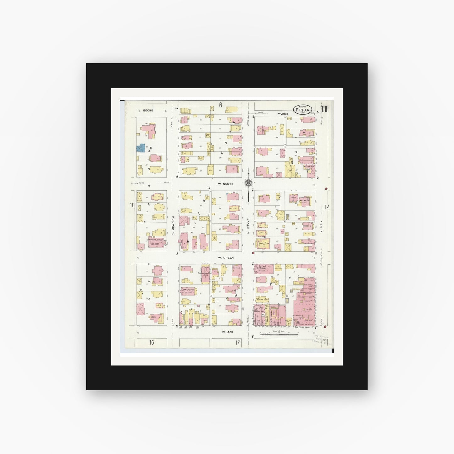 Old map wall art mockup — black gallery frame with white mat — Sanborn Fire Insurance Map from Piqua, Miami County, Ohio (1911), Sheet #0011