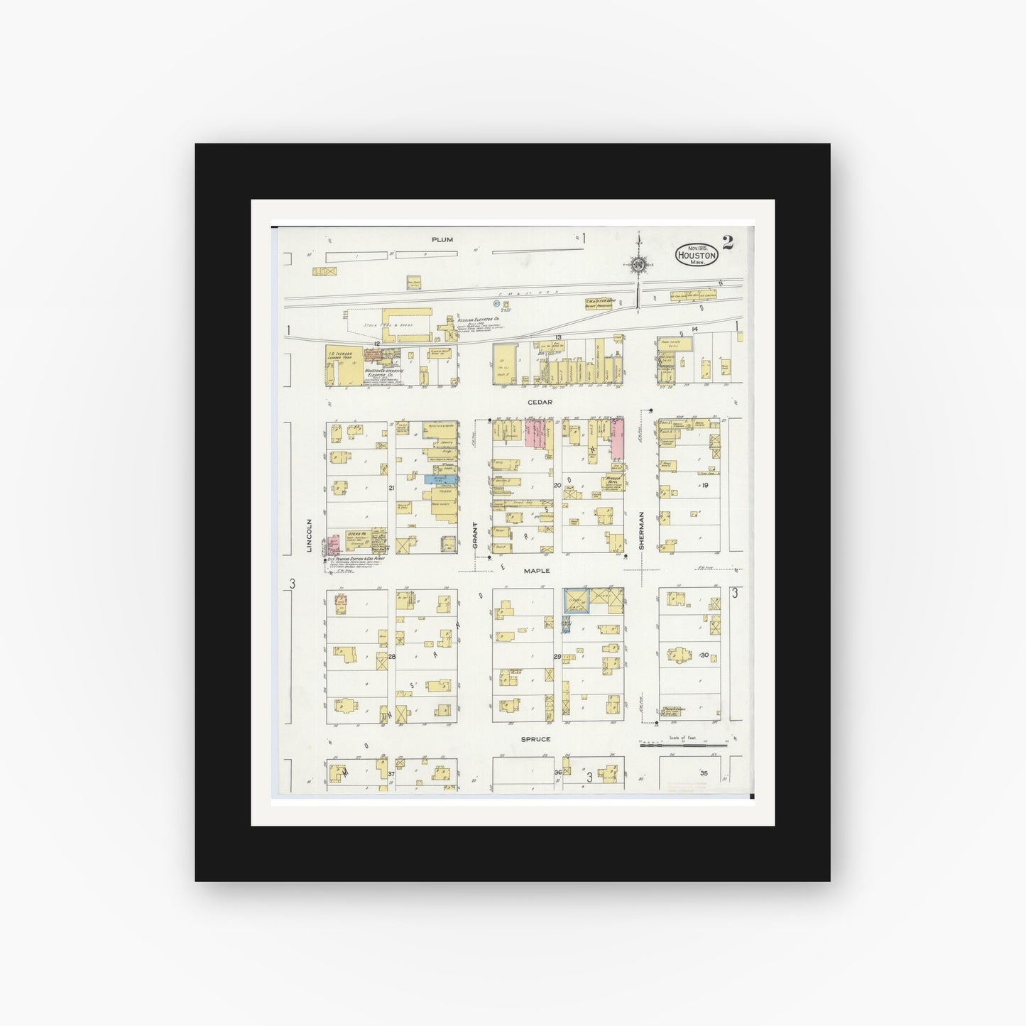 Old map wall art mockup — black gallery frame with white mat — Sanborn Fire Insurance Map from Houston, Houston County, Minnesota (1915), Sheet #0002