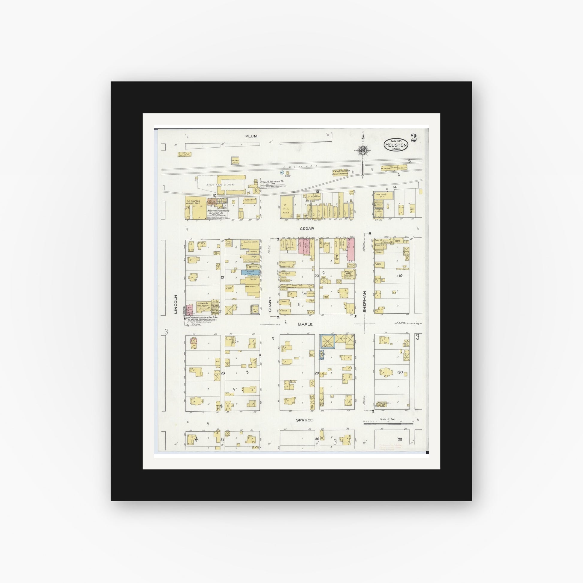 Old map wall art mockup — black gallery frame with white mat — Sanborn Fire Insurance Map from Houston, Houston County, Minnesota (1915), Sheet #0002