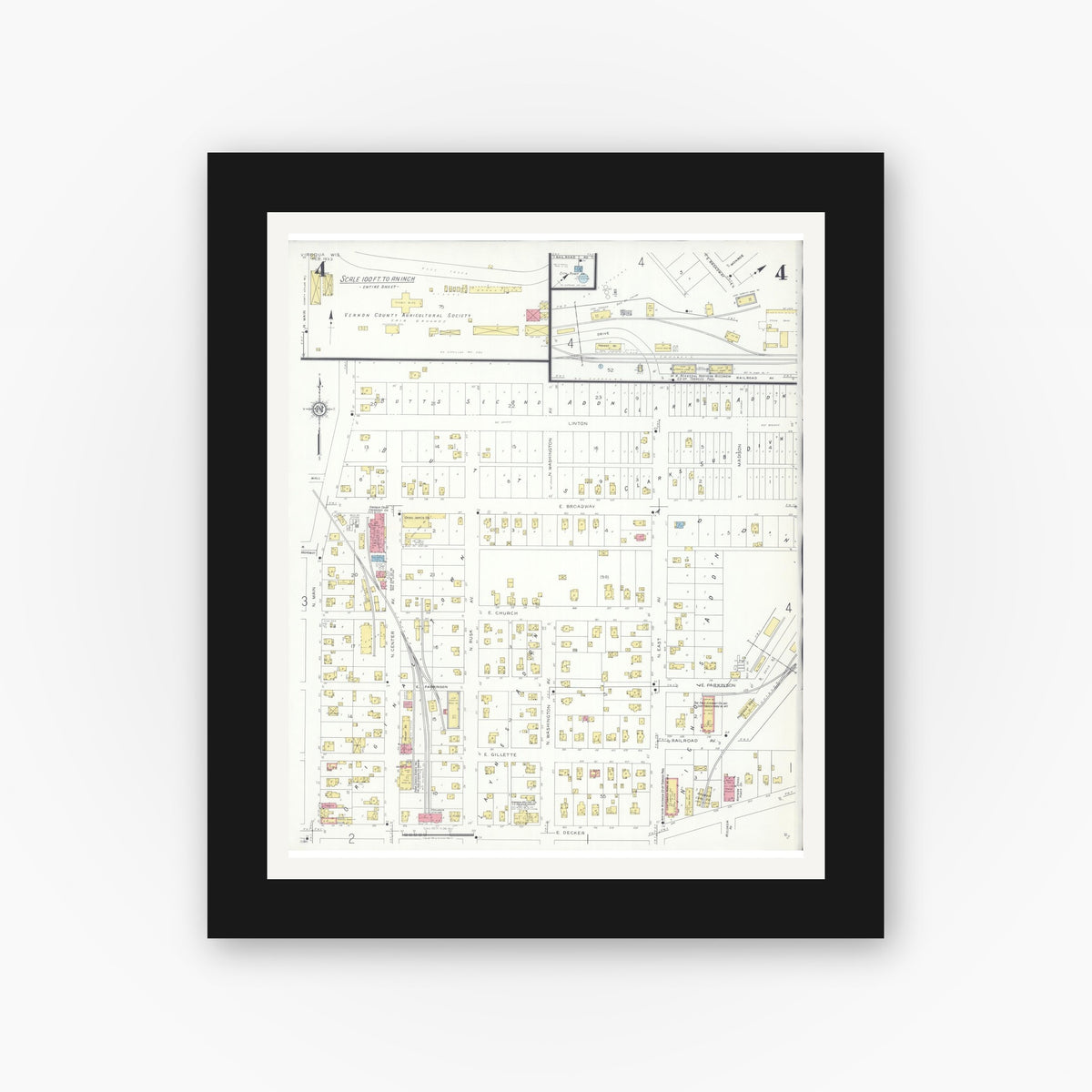 Old map wall art mockup — black gallery frame with white mat — Sanborn Fire Insurance Map from Viroqua, Vernon County, Wisconsin (1933), Sheet #0004