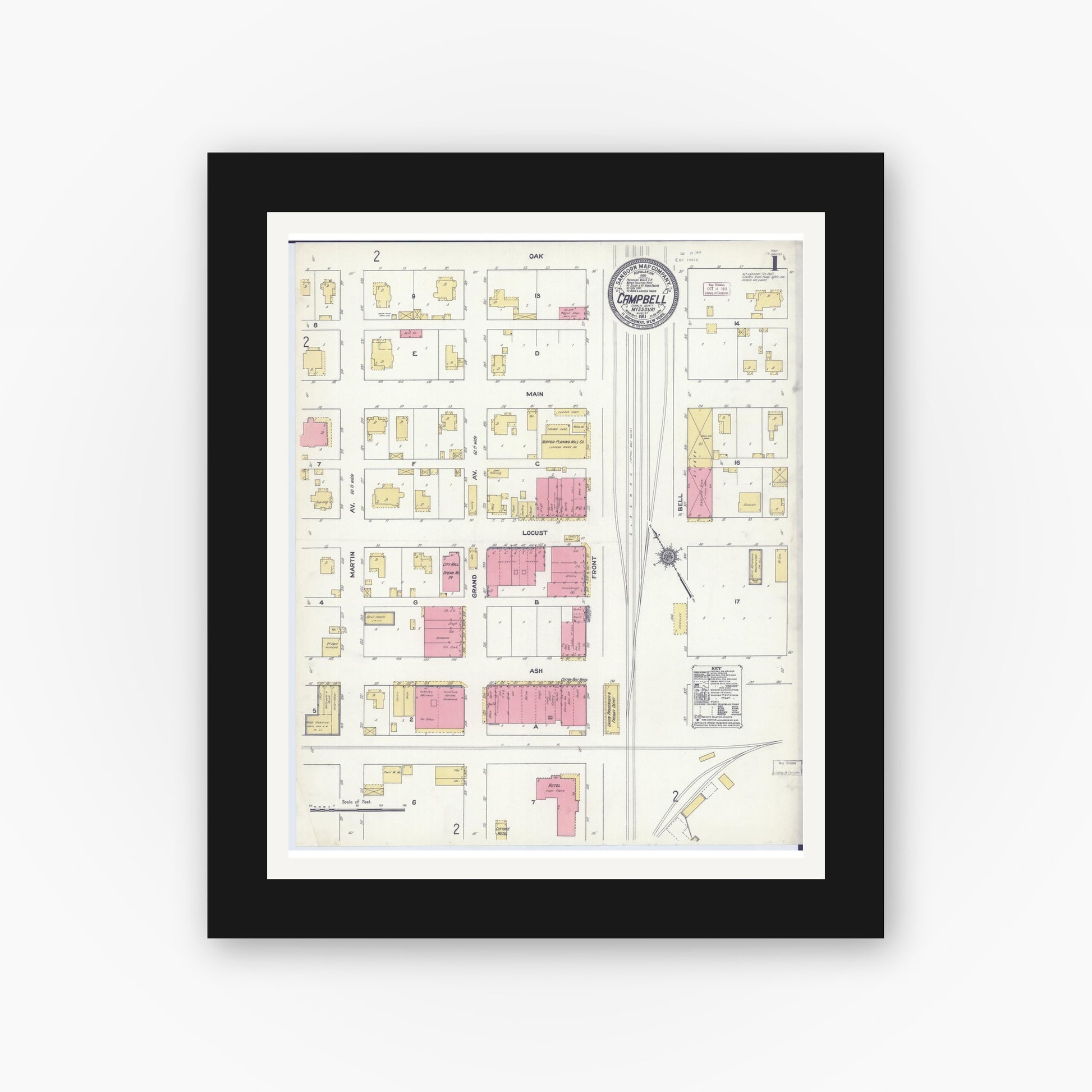 Old map wall art mockup — black gallery frame with white mat — Sanborn Fire Insurance Map from Campbell, Dunklin County, Missouri (1911) - Complete Map Set