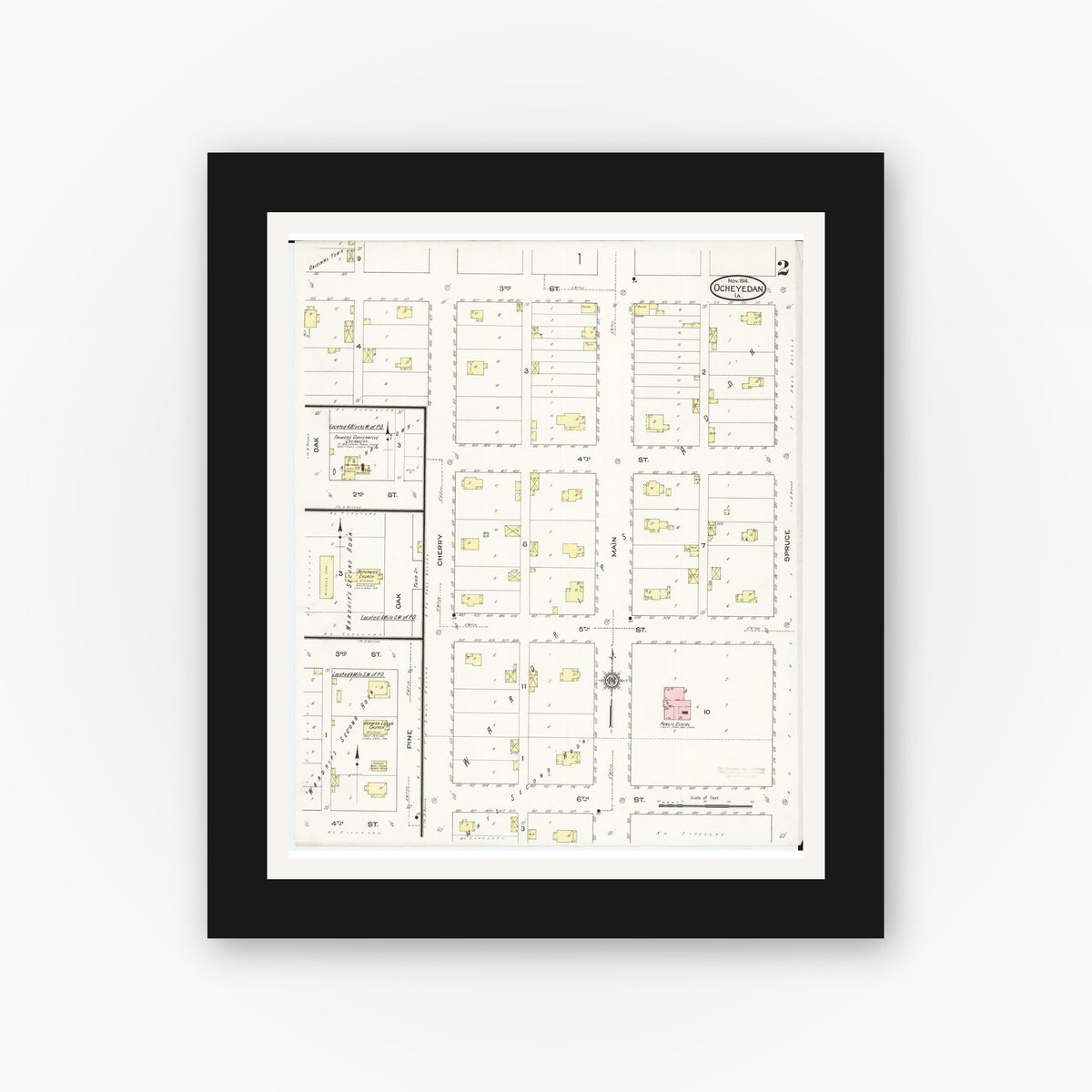 Old map wall art mockup — black gallery frame with white mat — Sanborn Fire Insurance Map from Ocheyedan, Osceola County, Iowa (1914), Sheet #0002