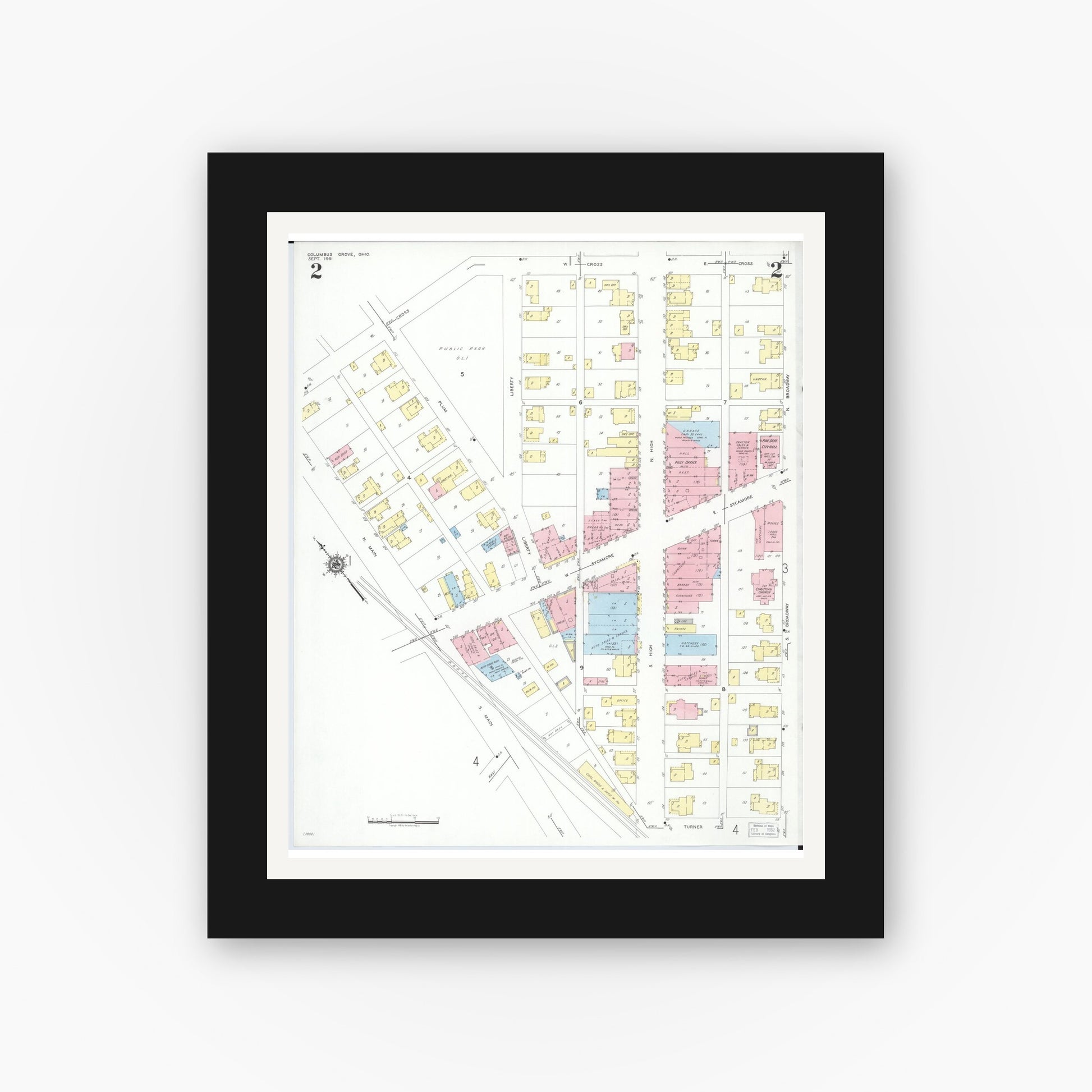 Old map wall art mockup — black gallery frame with white mat — Sanborn Fire Insurance Map from Columbus Grove, Putnam County, Ohio (1951), Sheet #0002