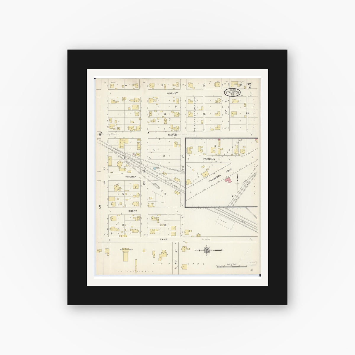 Old map wall art mockup — black gallery frame with white mat — Sanborn Fire Insurance Map from Staunton, Macoupin County, Illinois (1913), Sheet #0007