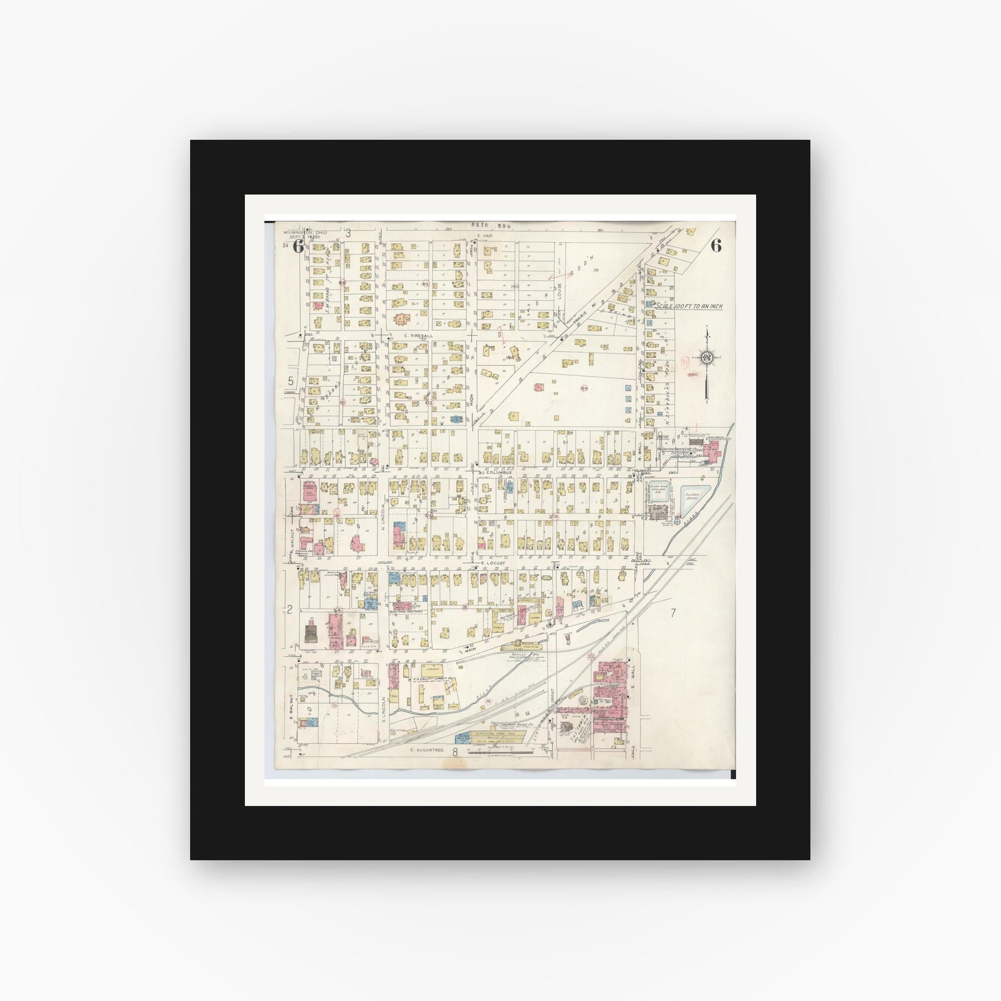 Old map wall art mockup — black gallery frame with white mat — Sanborn Fire Insurance Map from Wilmington, Clinton County, Ohio (1949), Sheet #0006