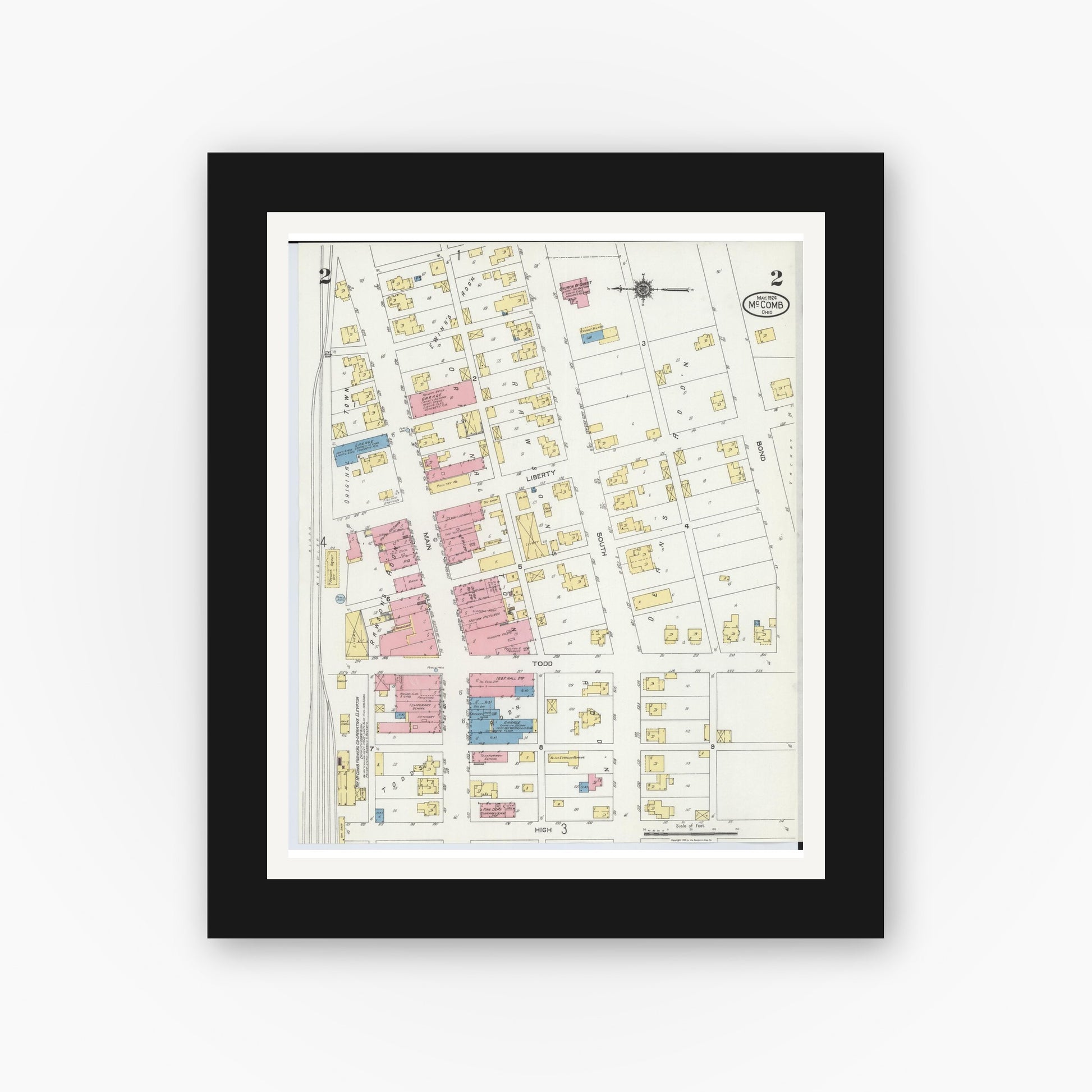 Old map wall art mockup — black gallery frame with white mat — Sanborn Fire Insurance Map from McComb, Hancock County, Ohio (1924), Sheet #0002