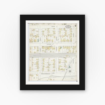 Old map wall art mockup — black gallery frame with white mat — Sanborn Fire Insurance Map from Cadillac, Wexford County, Michigan (1895), Sheet #0002