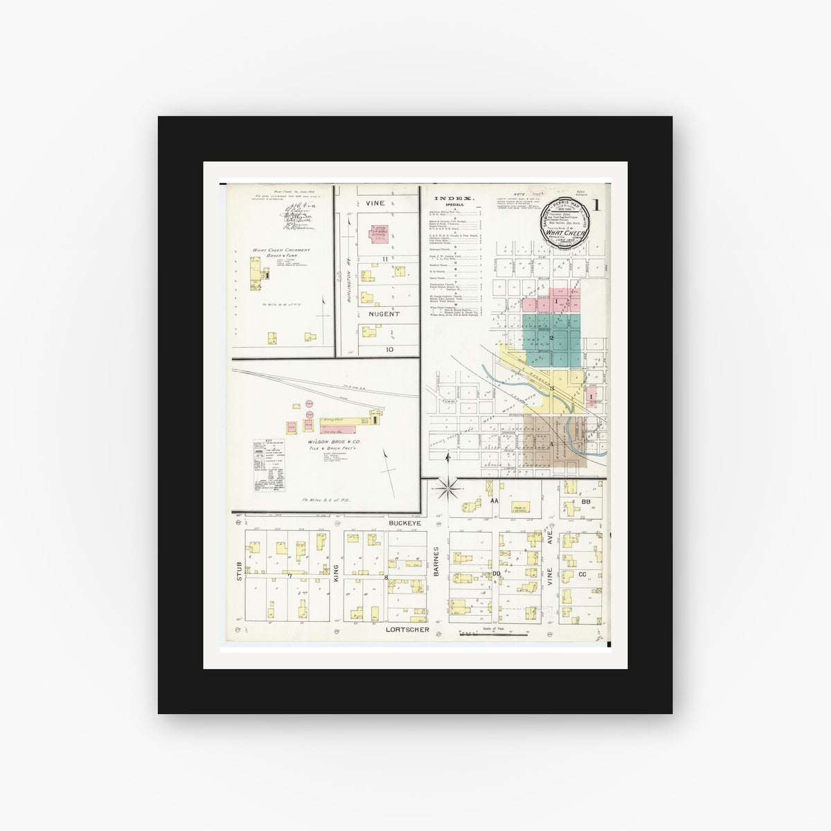 Old map wall art mockup — black gallery frame with white mat — Sanborn Fire Insurance Map from What Cheer, Keokuk County, Iowa (1893), Sheet #0001
