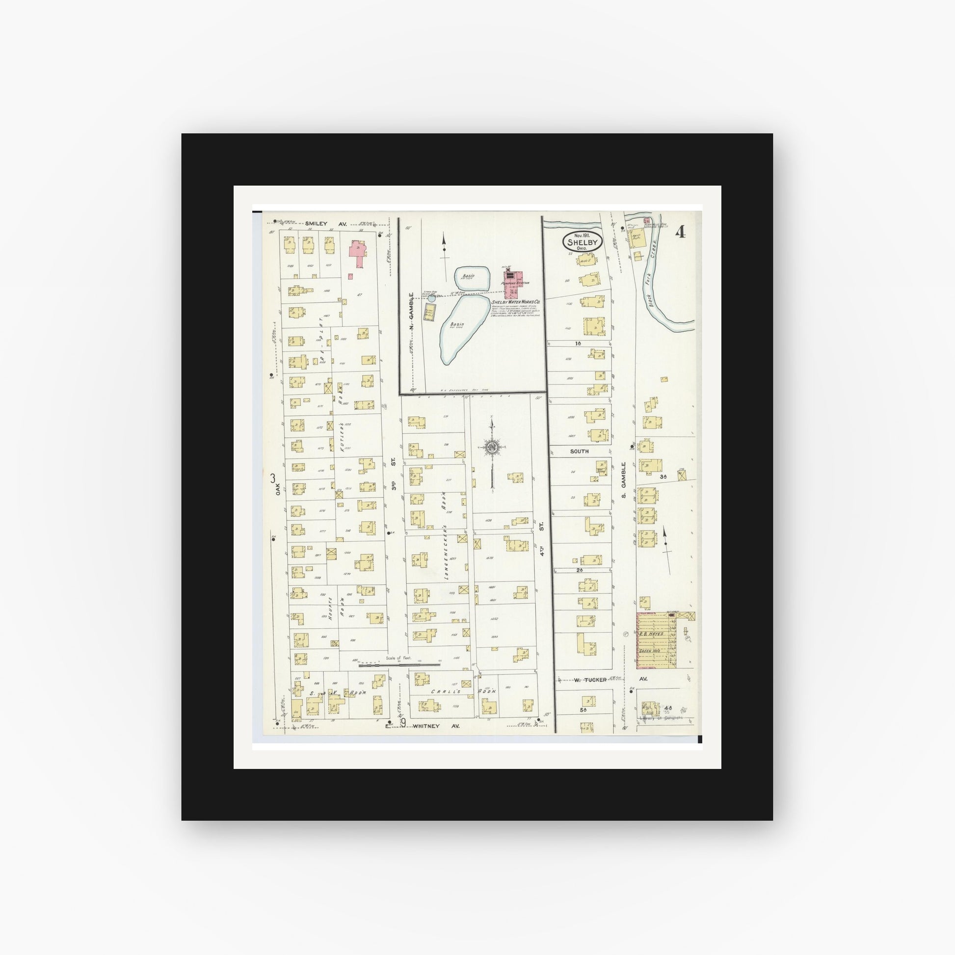 Old map wall art mockup — black gallery frame with white mat — Sanborn Fire Insurance Map from Shelby, Richland County, Ohio (1911), Sheet #0004
