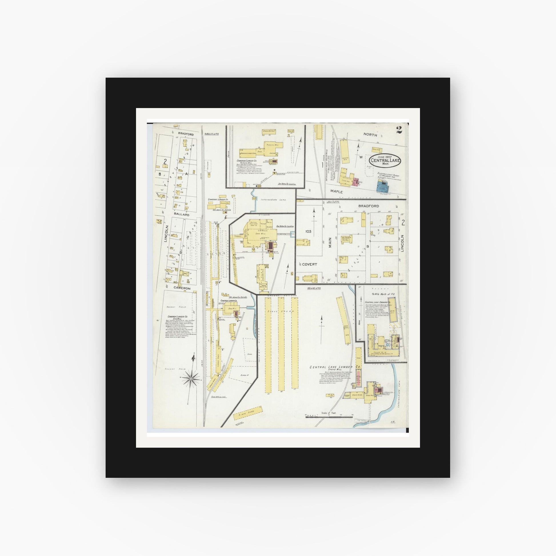 Old map wall art mockup — black gallery frame with white mat — Sanborn Fire Insurance Map from Central Lake, Antrim County, Michigan (1907), Sheet #0002