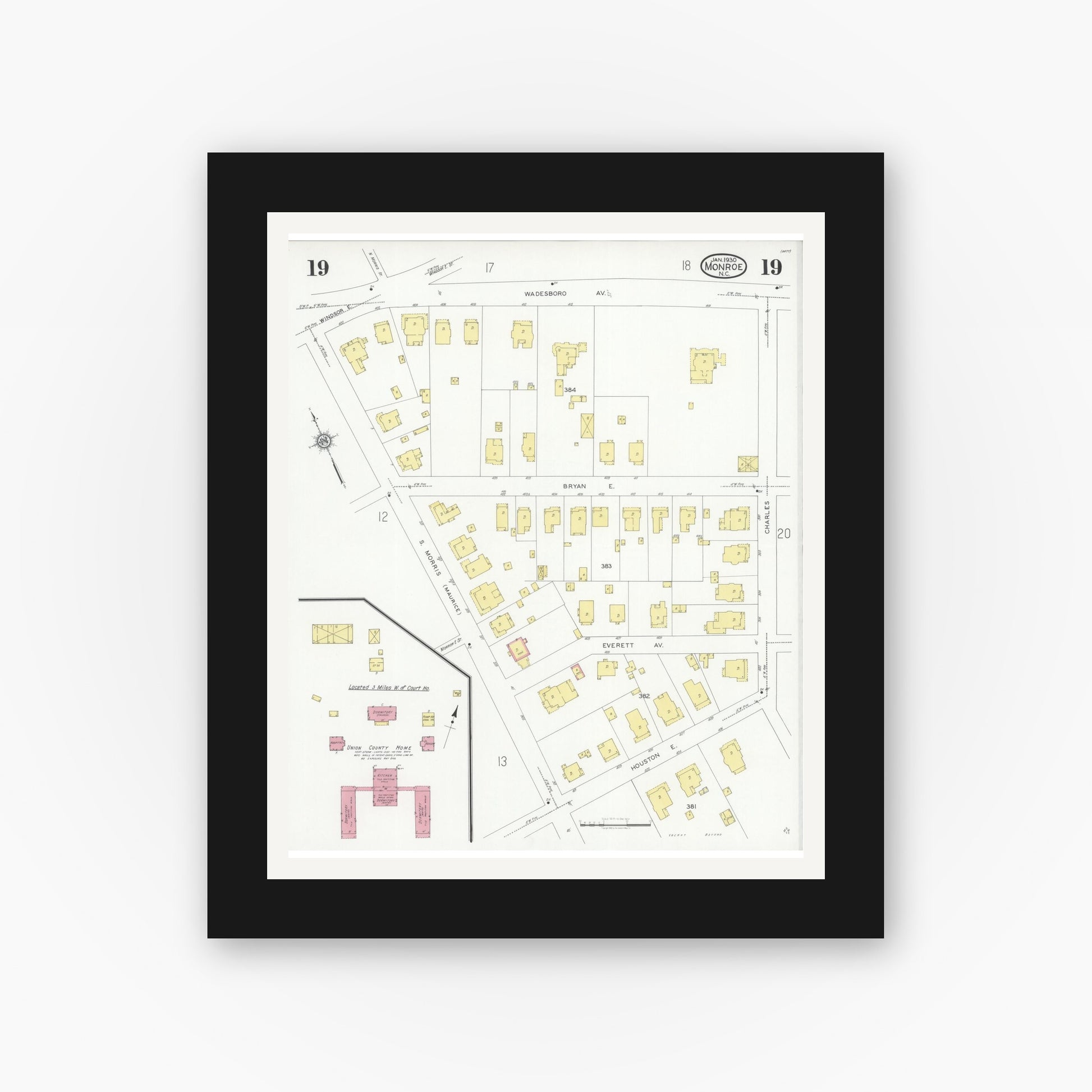 Old map wall art mockup — black gallery frame with white mat — Sanborn Fire Insurance Map from Monroe, Union County, North Carolina (1930), Sheet #0019