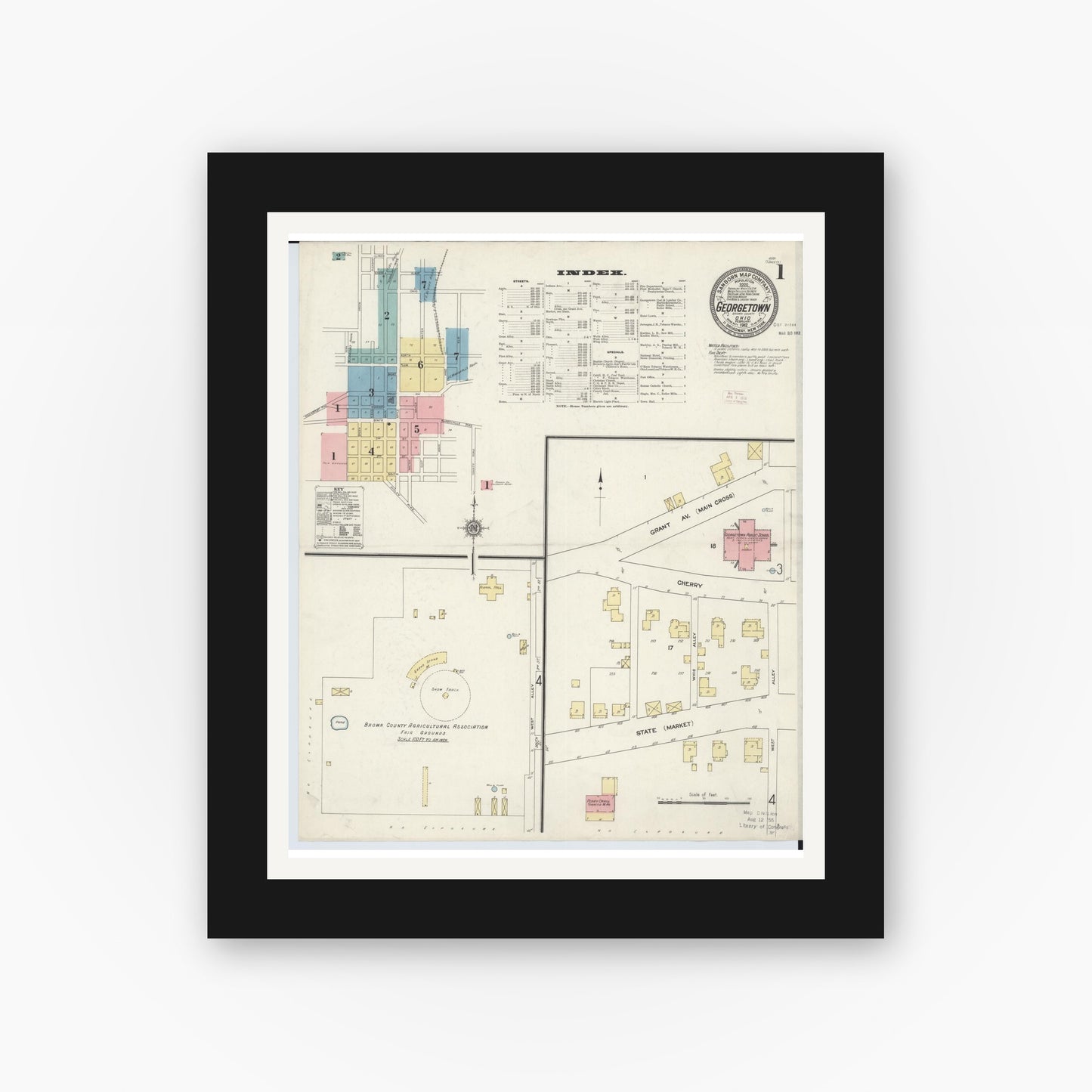 Old map wall art mockup — black gallery frame with white mat — Sanborn Fire Insurance Map from Georgetown, Brown County, Ohio (1912), Sheet #0001
