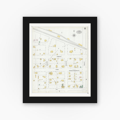 Old map wall art mockup — black gallery frame with white mat — Sanborn Fire Insurance Map from Toulon, Stark County, Illinois (1899), Sheet #0002
