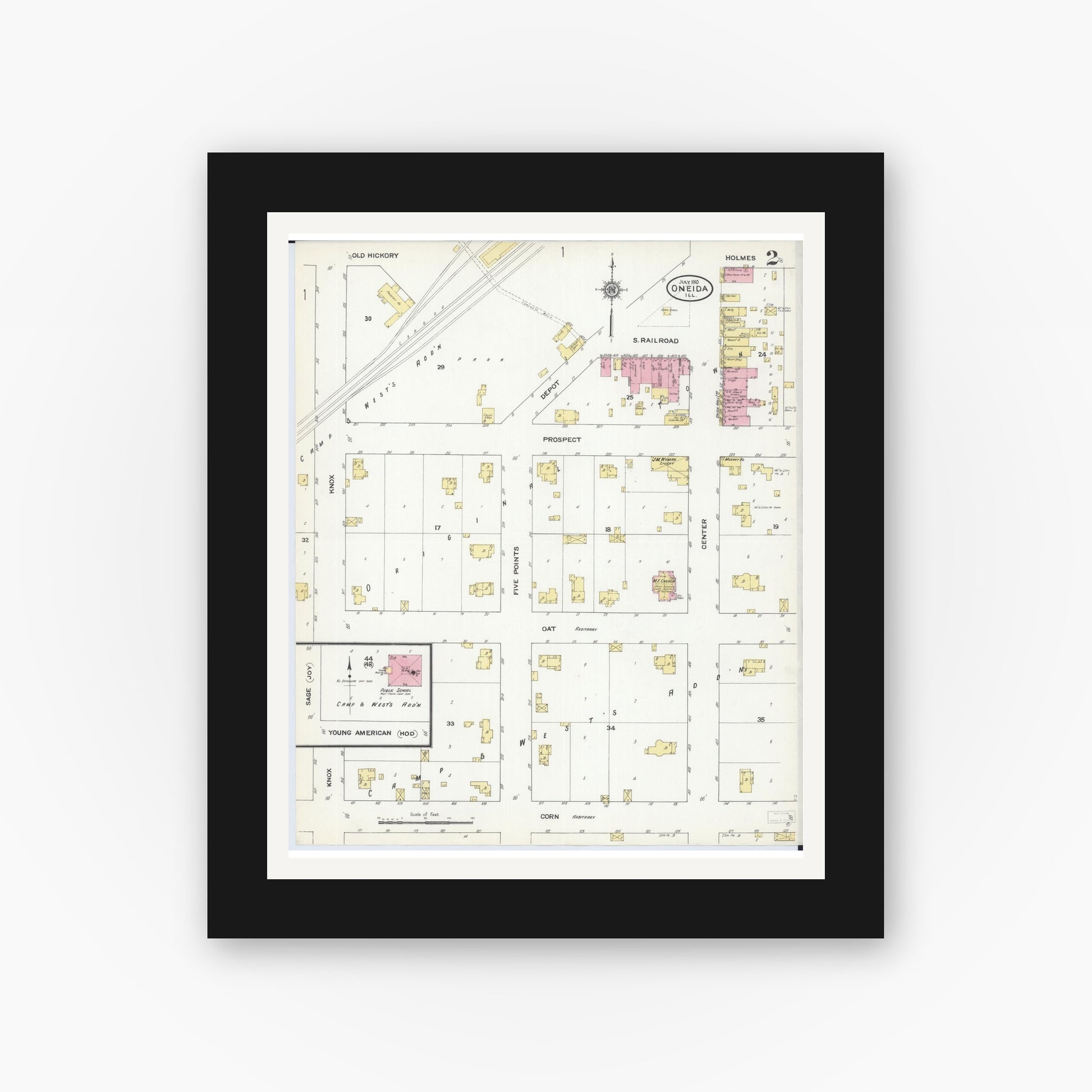 Old map wall art mockup — black gallery frame with white mat — Sanborn Fire Insurance Map from Oneida, Knox County, Illinois (1910), Sheet #0002