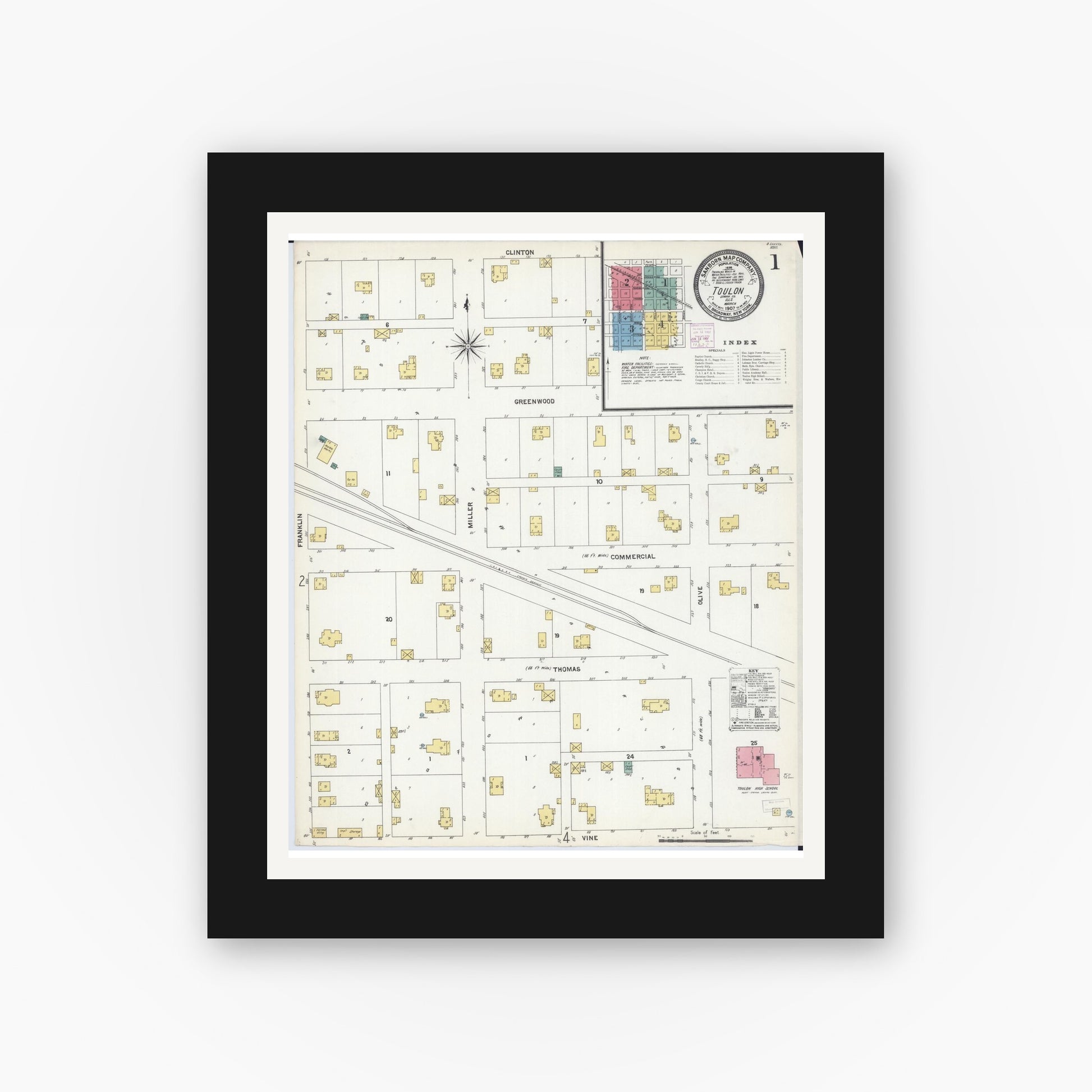 Old map wall art mockup — black gallery frame with white mat — Sanborn Fire Insurance Map from Toulon, Stark County, Illinois (1907), Sheet #0001