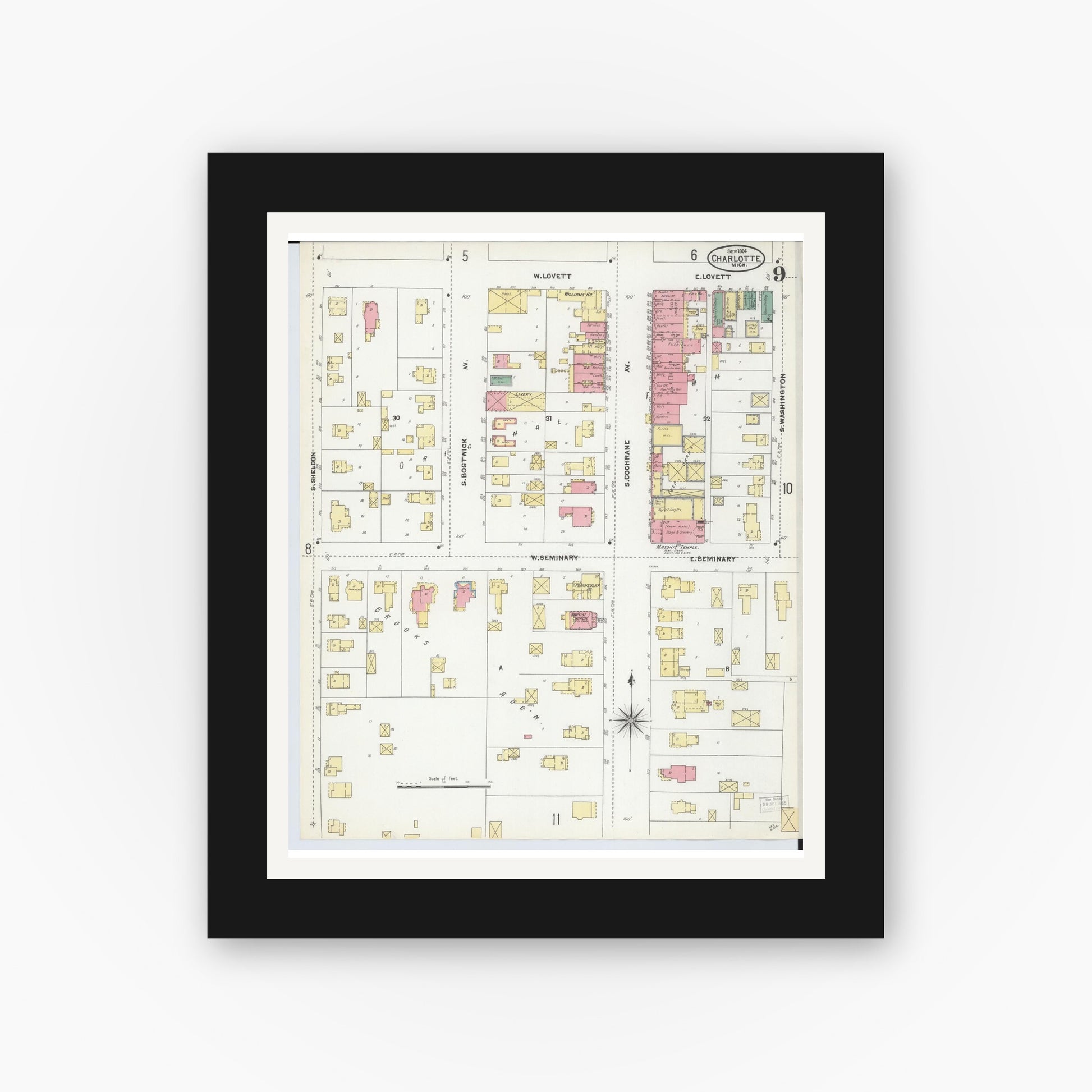Old map wall art mockup — black gallery frame with white mat — Sanborn Fire Insurance Map from Charlotte, Eaton County, Michigan (1904), Sheet #0009
