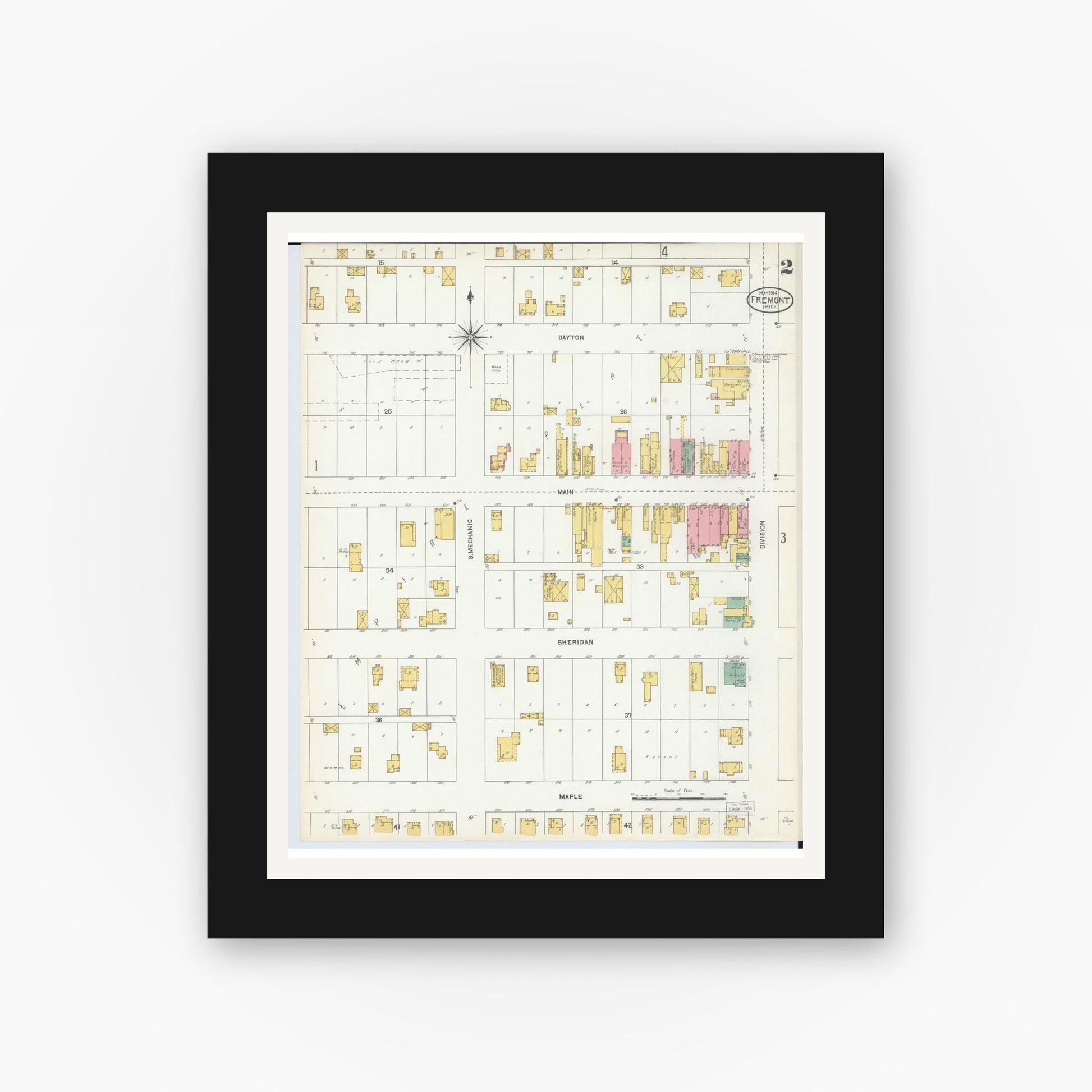 Old map wall art mockup — black gallery frame with white mat — Sanborn Fire Insurance Map from Fremont, Newaygo County, Michigan (1904), Sheet #0002