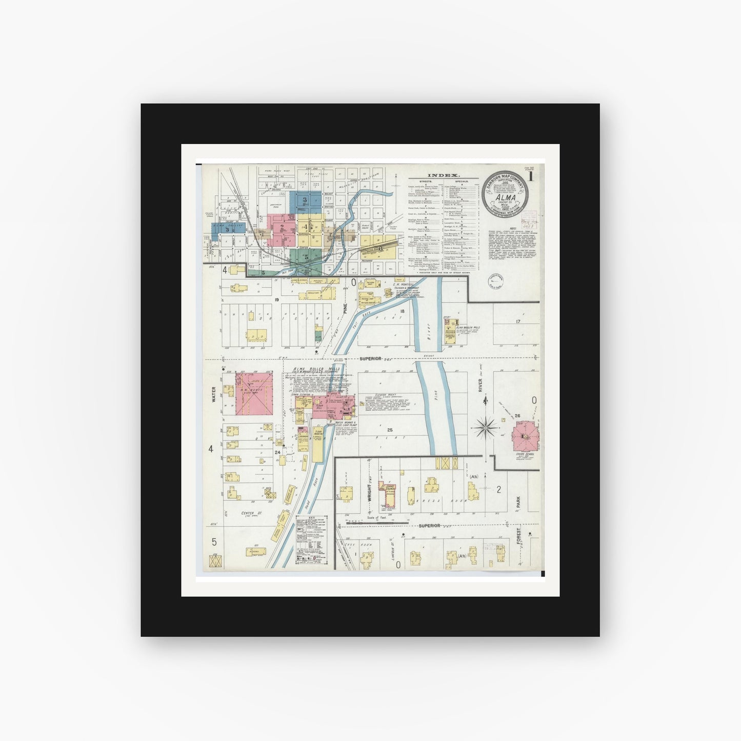 Old map wall art mockup — black gallery frame with white mat — Sanborn Fire Insurance Map from Alma, Gratiot County, Michigan (1902), Sheet #0001